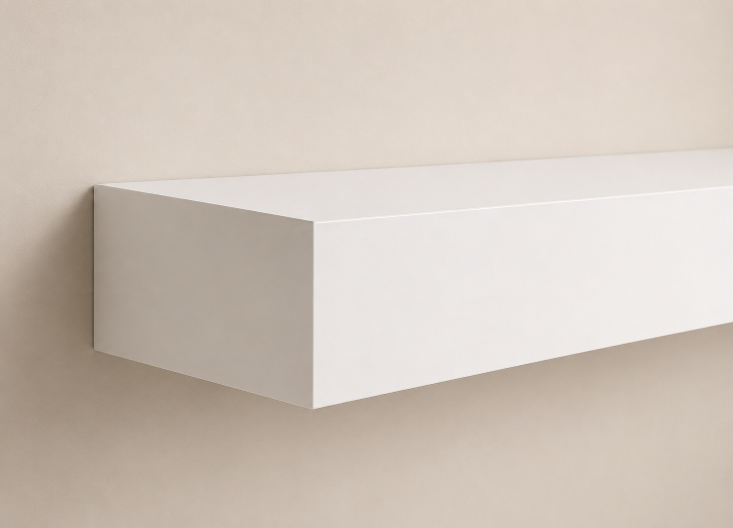 White floating shelf mounted on a beige wall.