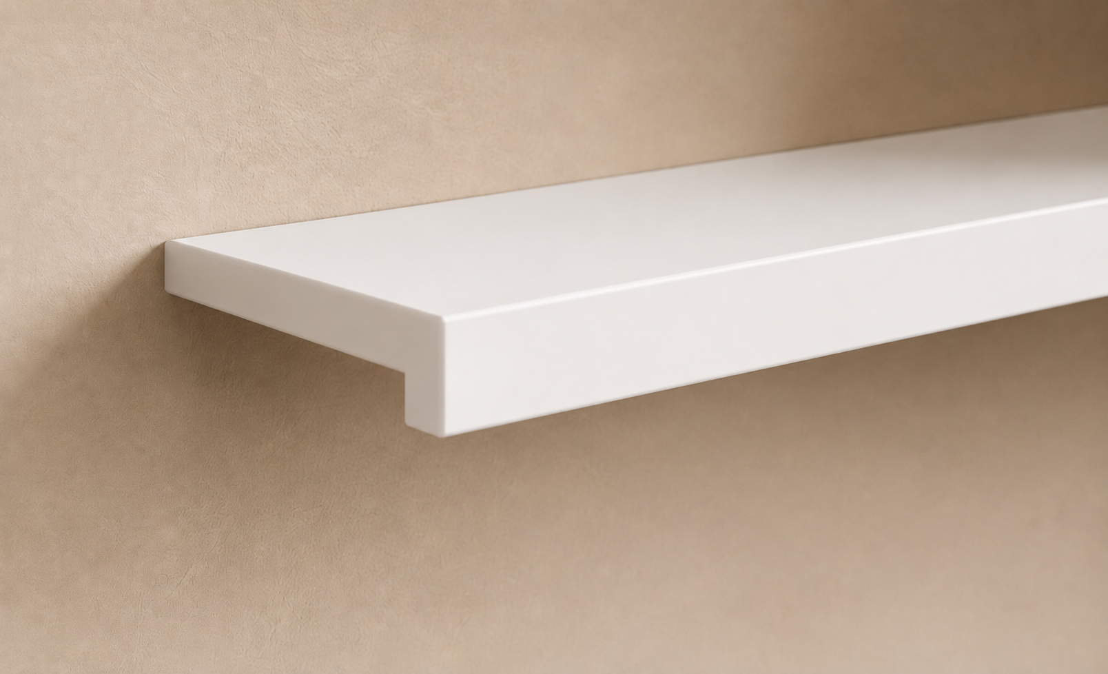 White painted floating shelf mounted on a beige wall.