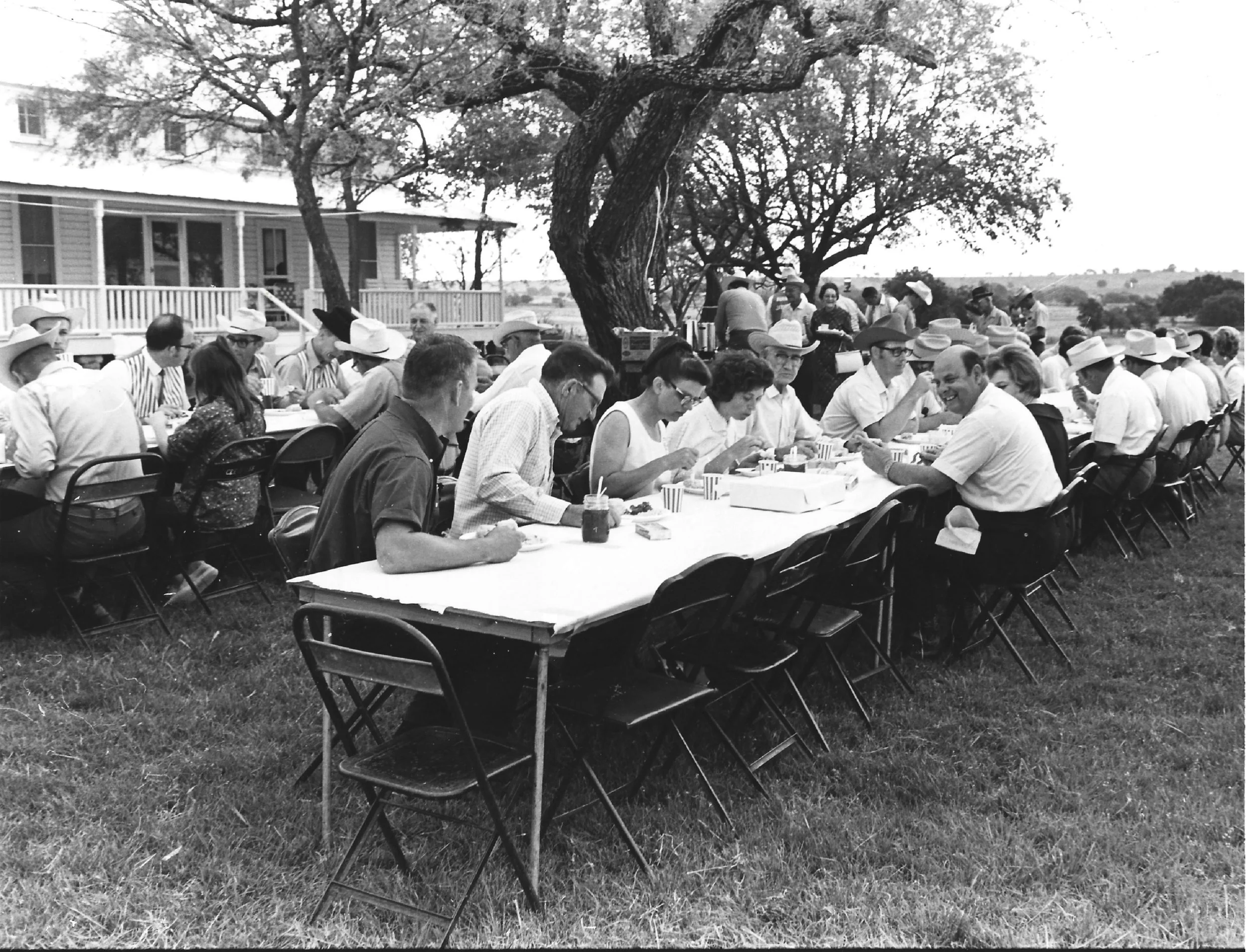 June, 26, 1970. Members of The American Hereford Association gather for an event in front of the ranch house.