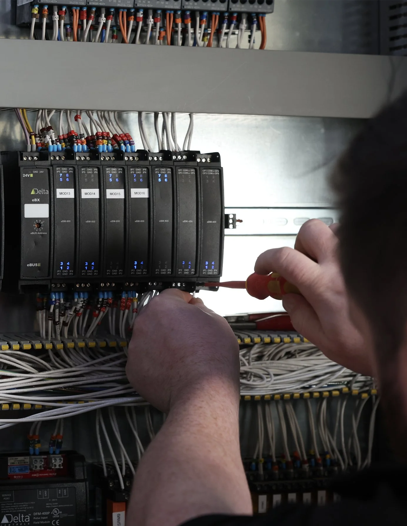 BAC team member installing a building control system