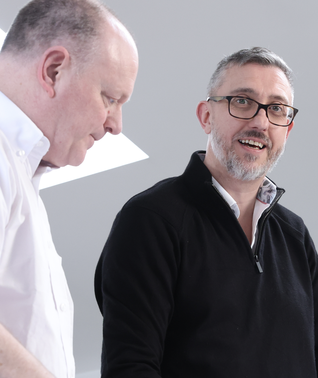 Two BAC team members discussing a project