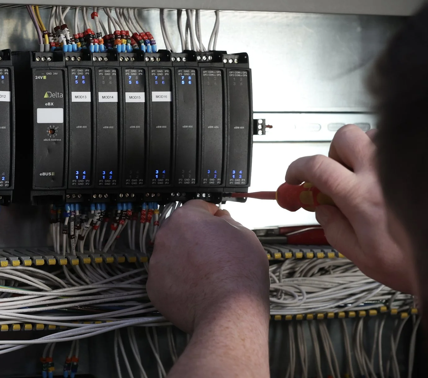 BAC team member installing a smart building control system