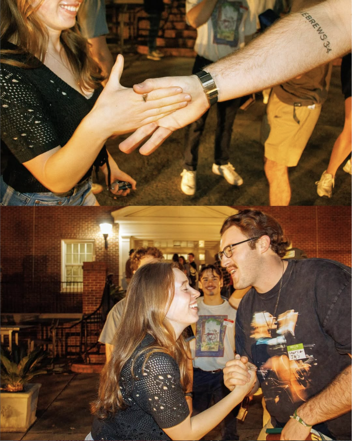 Two women shaking hands and smiling at each other, with a group of people in the background at night.