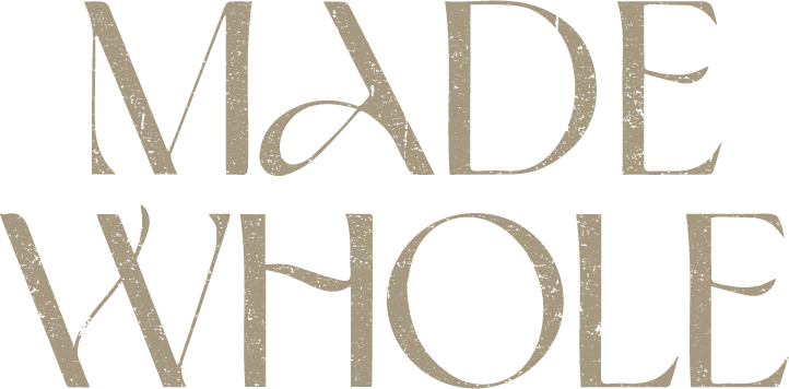 Text reading 'Made Whole' in large, stylized font.