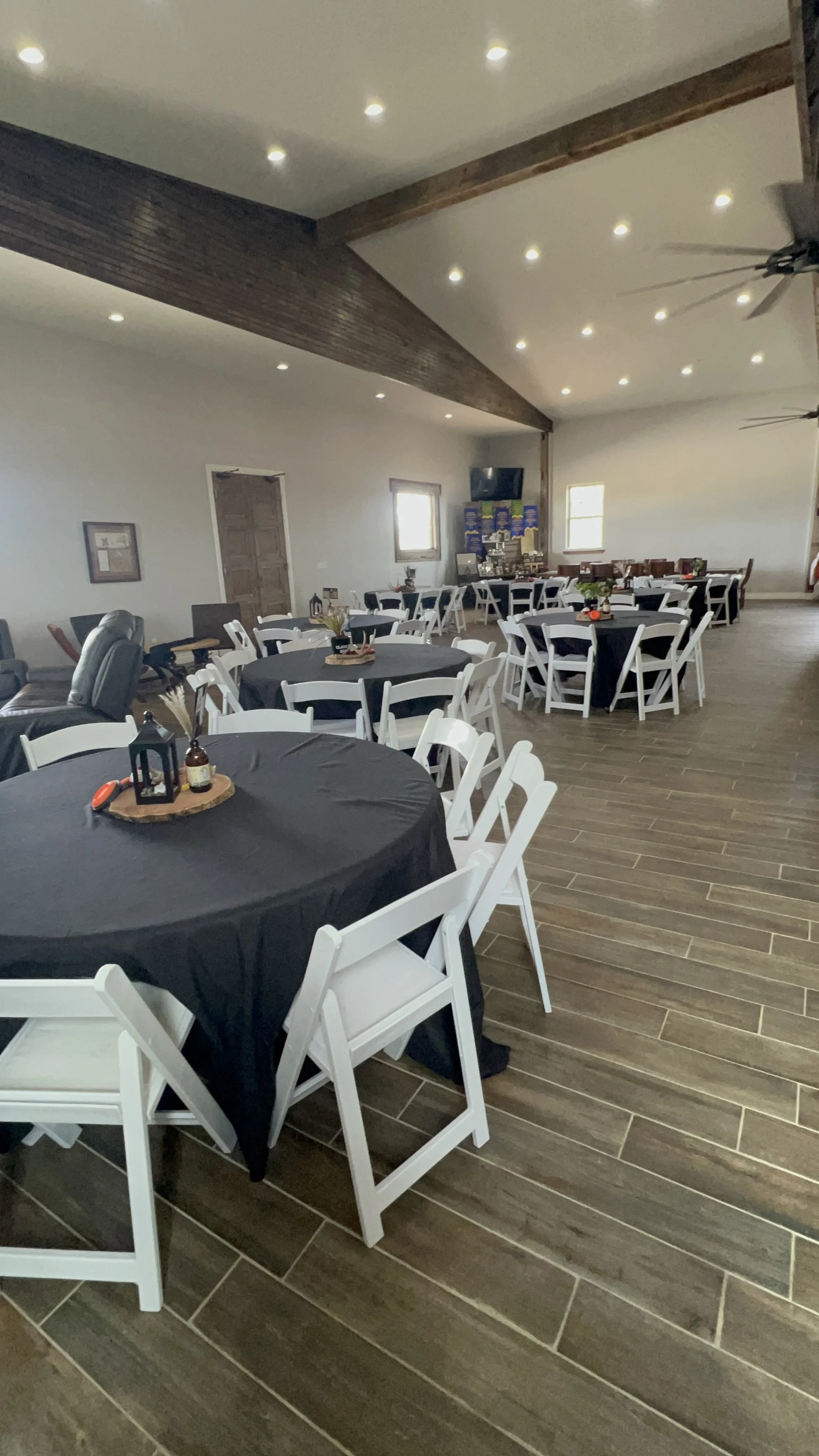 Indoor venue space set up with tables