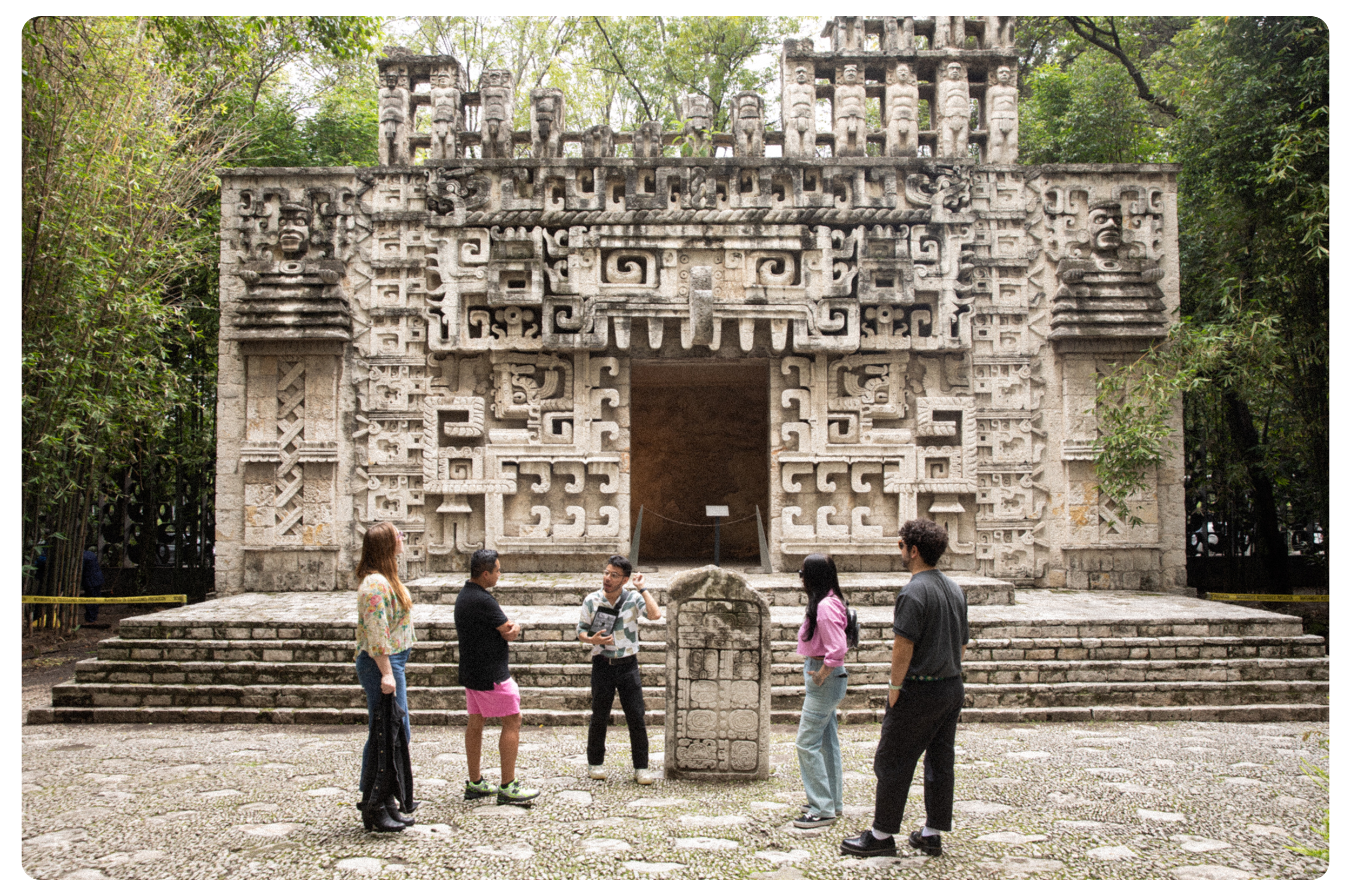 Carlos speaks to guests in the Mayan Hall of the Anthropology Museum tour.
