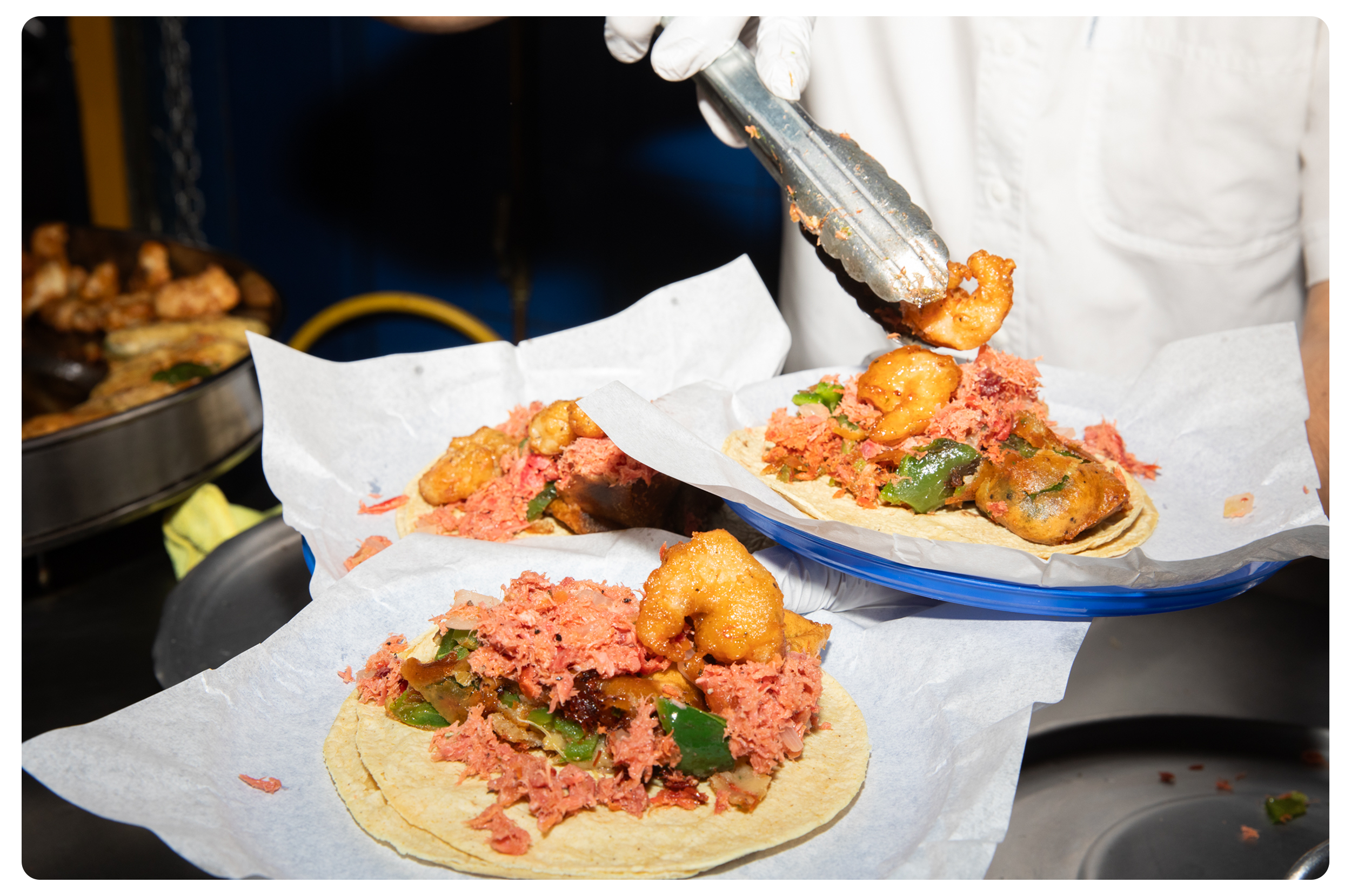 Avidan presents a plate of tacos from one of the stops on the CDMX local taco tour in Roma Norte.