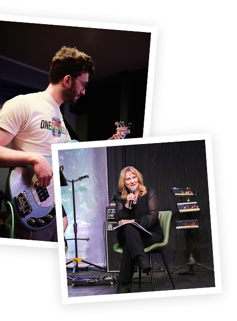 A young man playing an electric bass guitar and a woman sitting in a chair holding a microphone, speaking or singing during a live performance or interview on a stage.