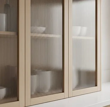 Wooden cabinet with ribbed glass sliding doors