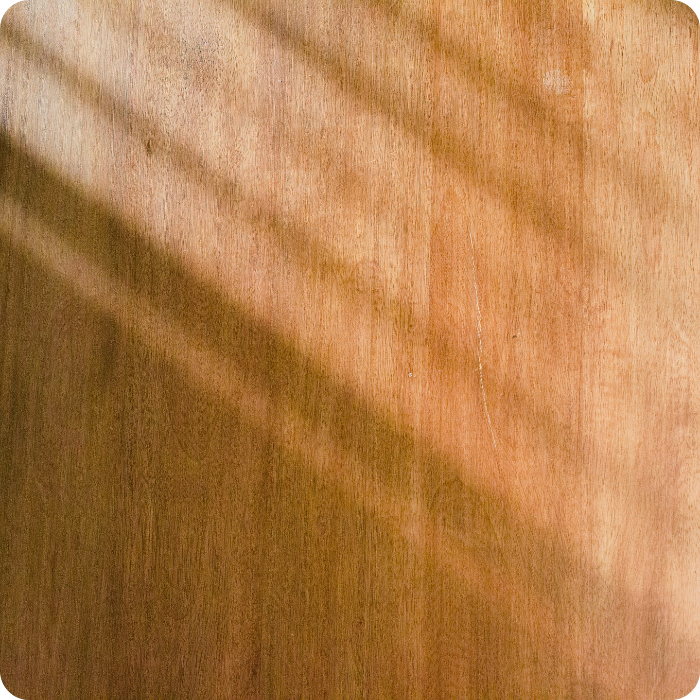 Close-up of a person's face with a playful tongue sticking out.