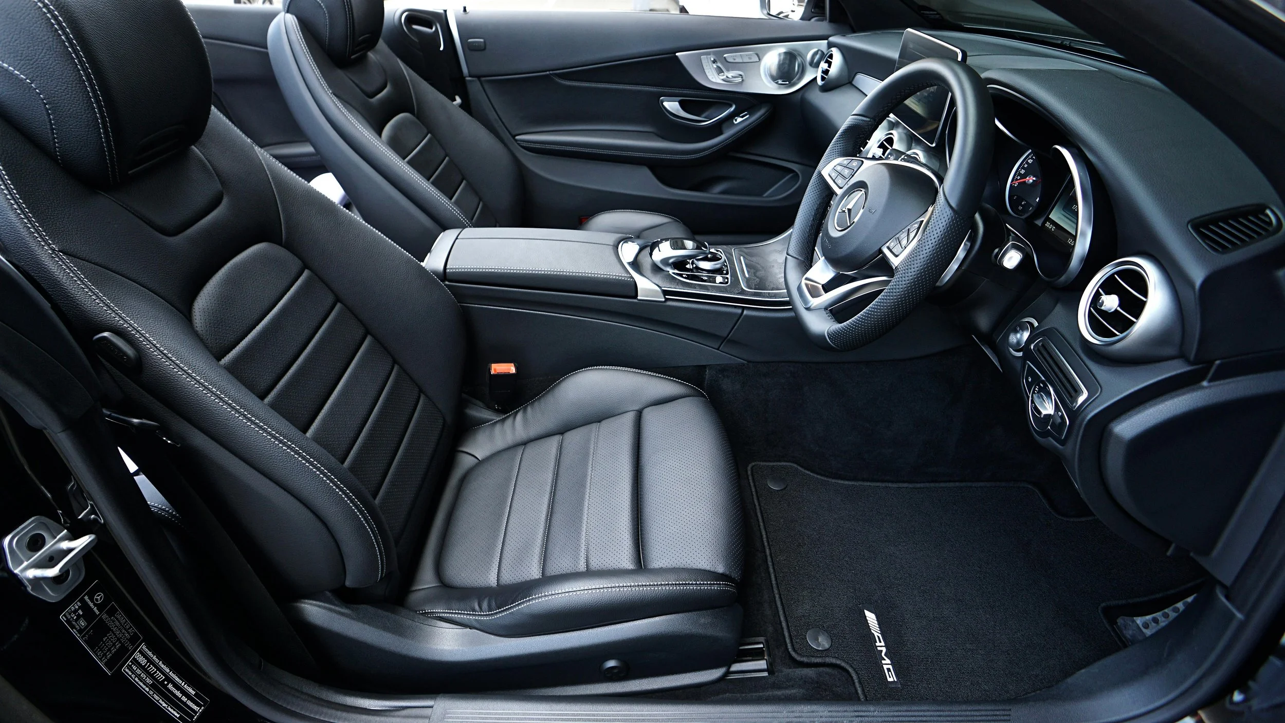 black-mercedes-benz-sports-car-interior-1104768.jpg