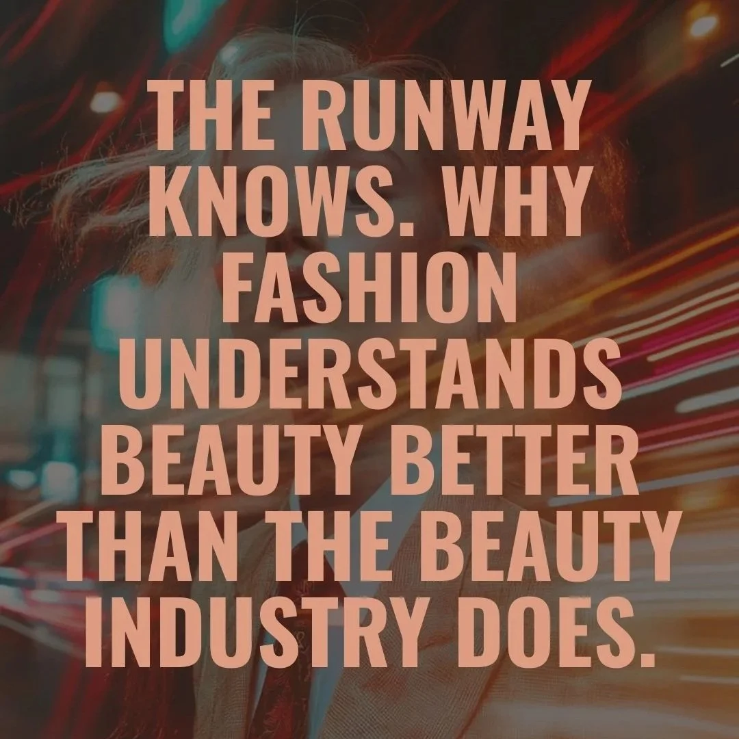 Text overlay on a background of a fashion runway with streaks of lights, stating "The runway knows. Why fashion understands beauty better than the beauty industry does." luxury beauty, fragrance, skincare, haircare, fashion editorial, beauty editoria
