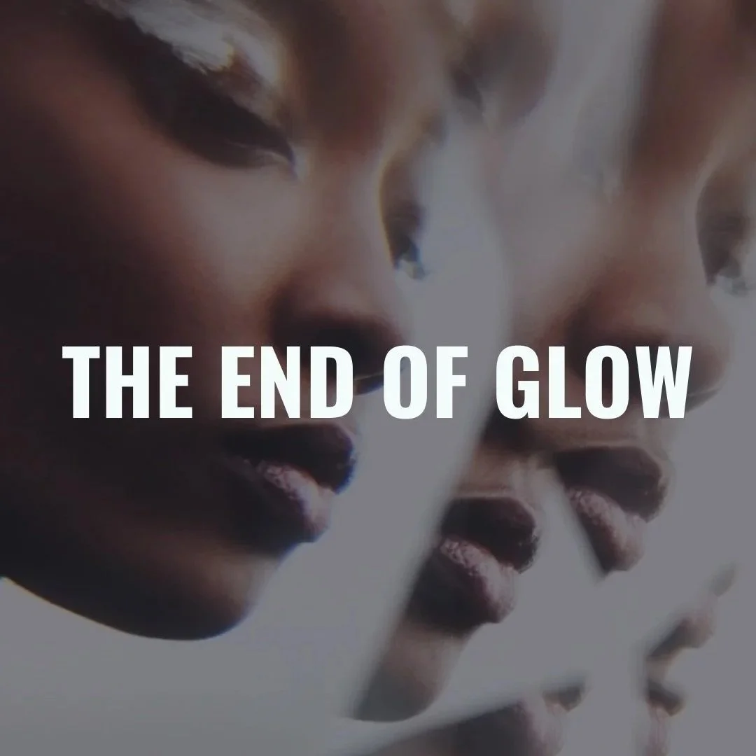Close-up of a sculpture or artwork of a face with multiple profiles, with the text 'THE END OF GLOW' overlaid. luxury beauty, fragrance, skincare, haircare, fashion editorial, beauty editorial, cosmetics, cinematic, editorial, moody, high fashion, av