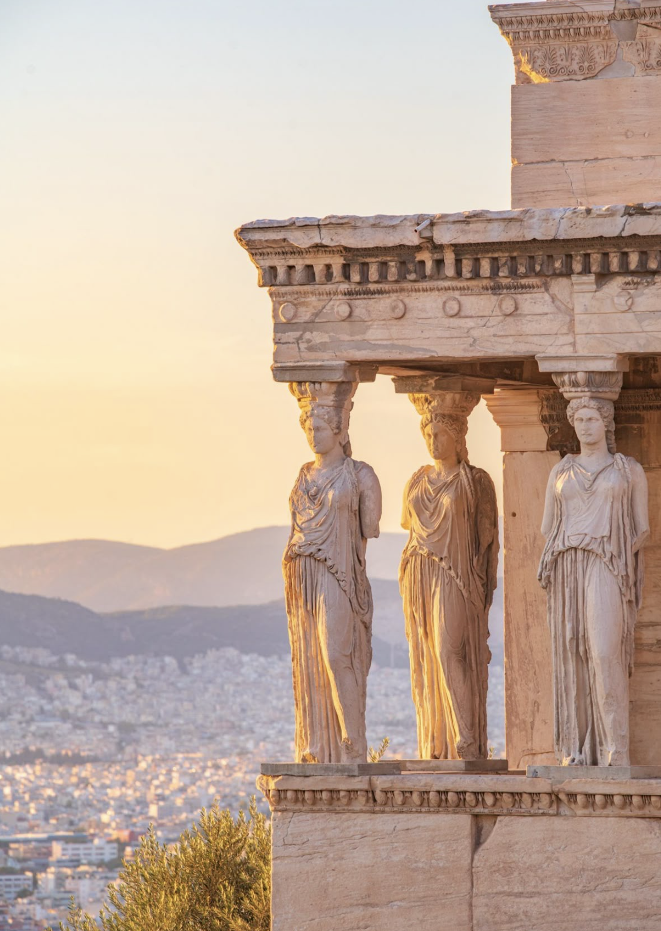Close-up of ancient Greek caryatids at sunset.