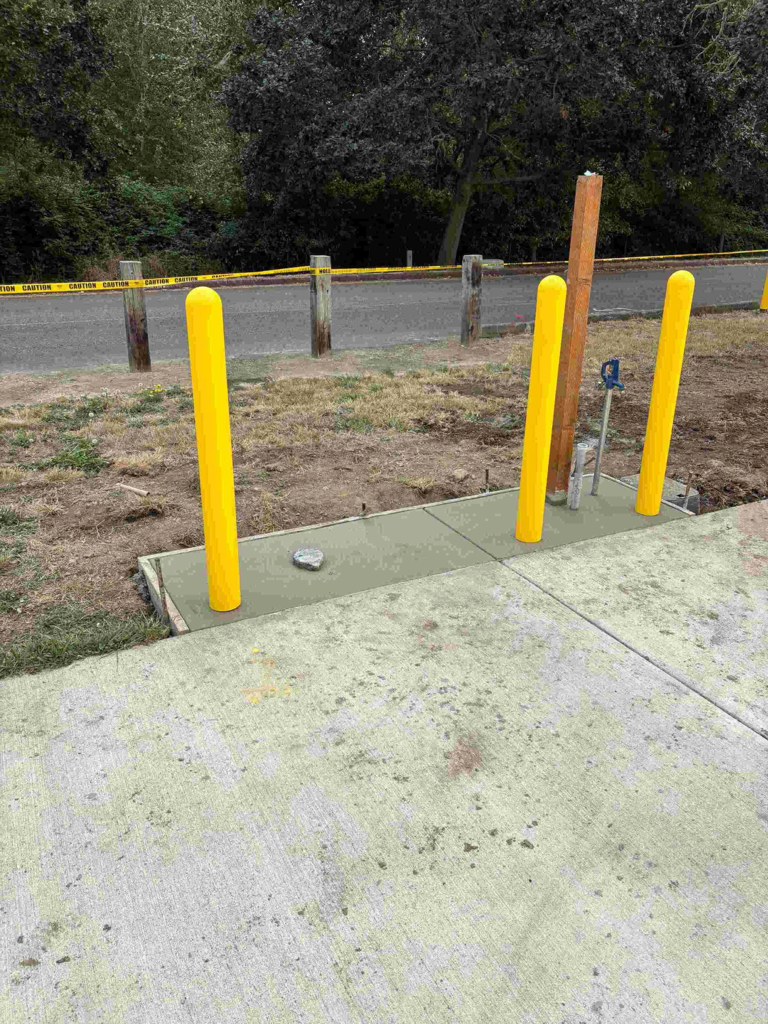 BALLARDS IN FRESH CONCRETE