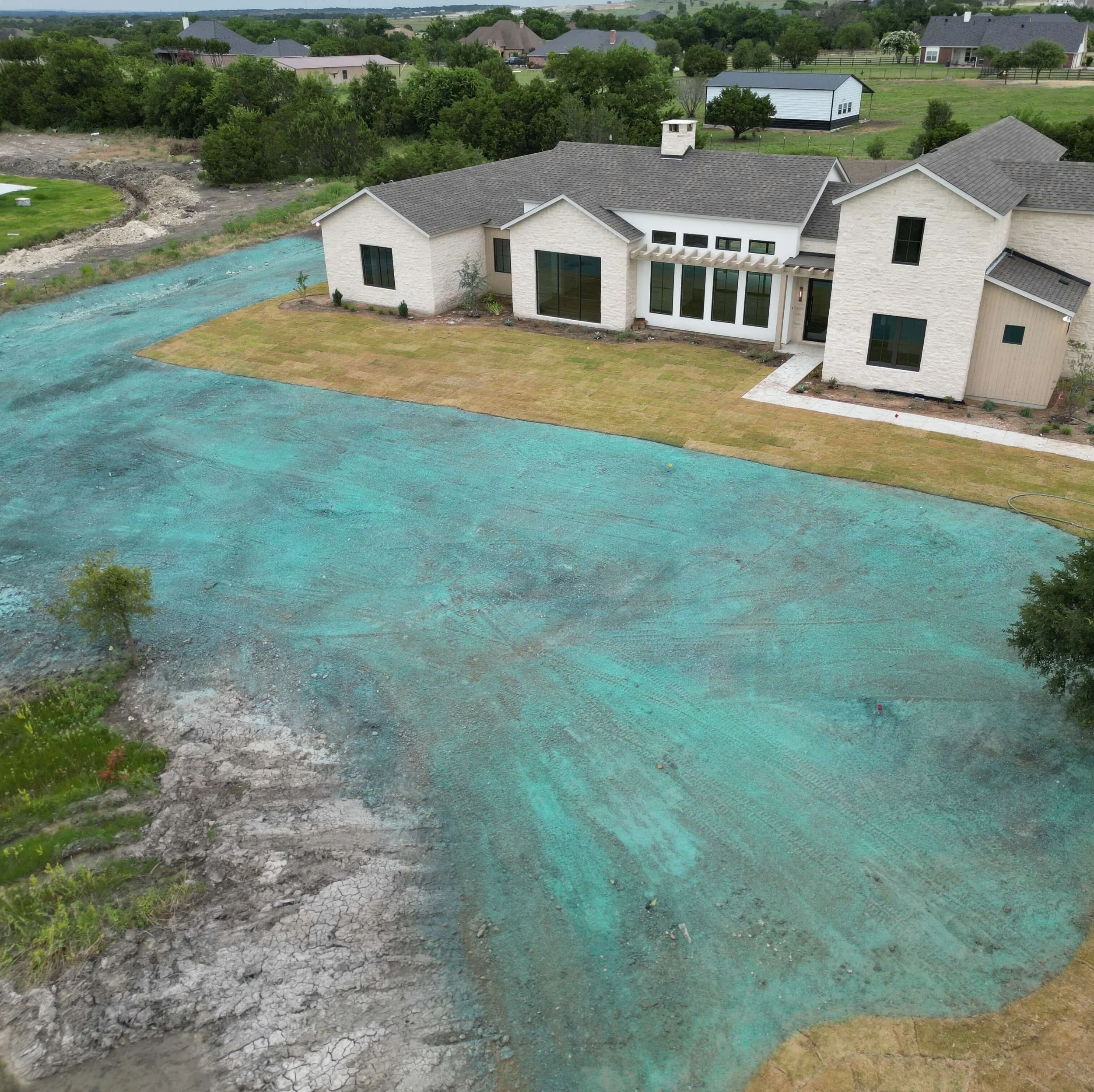 House with sod and hydromulch