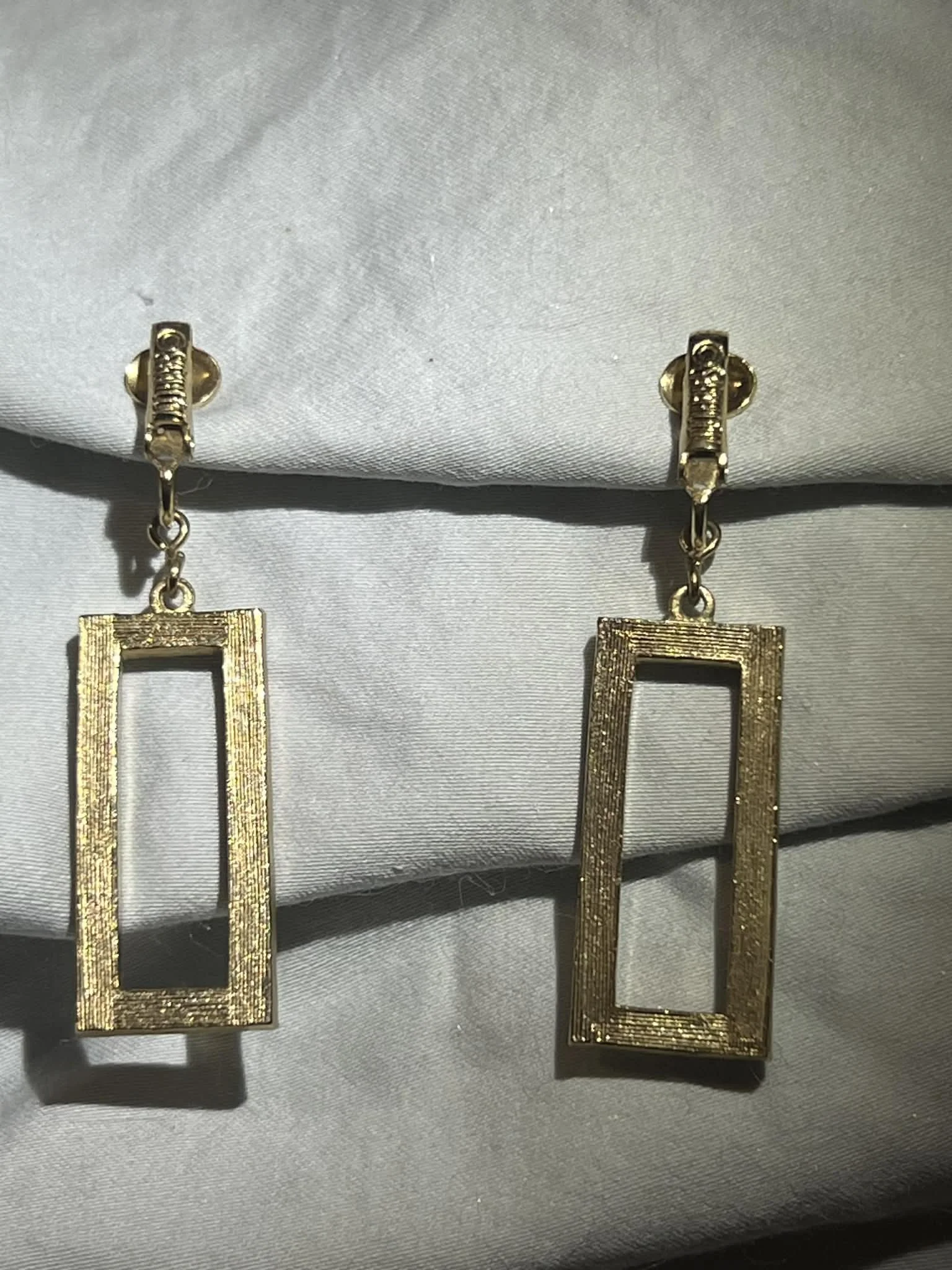 Saraha Coventry rectangle clip earrings 3.jpeg