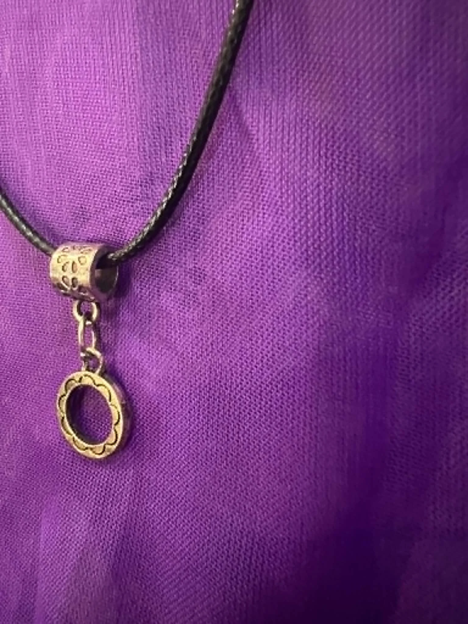 Sterling Silver Round Flower Pendant with a braided nylon rope 3.jfif