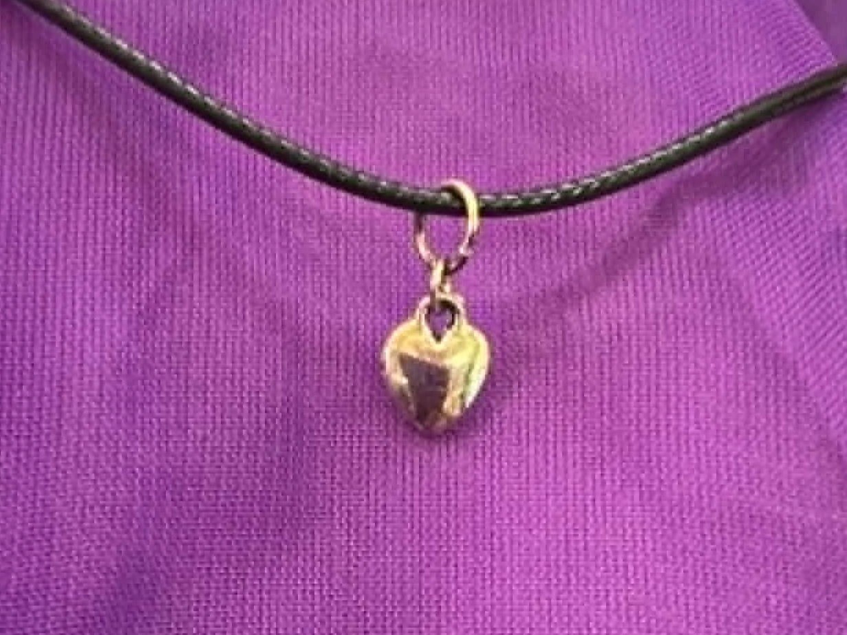 Sterling+Silver+Heart+Pendant+with+a+braided+nylon+rope+3.png