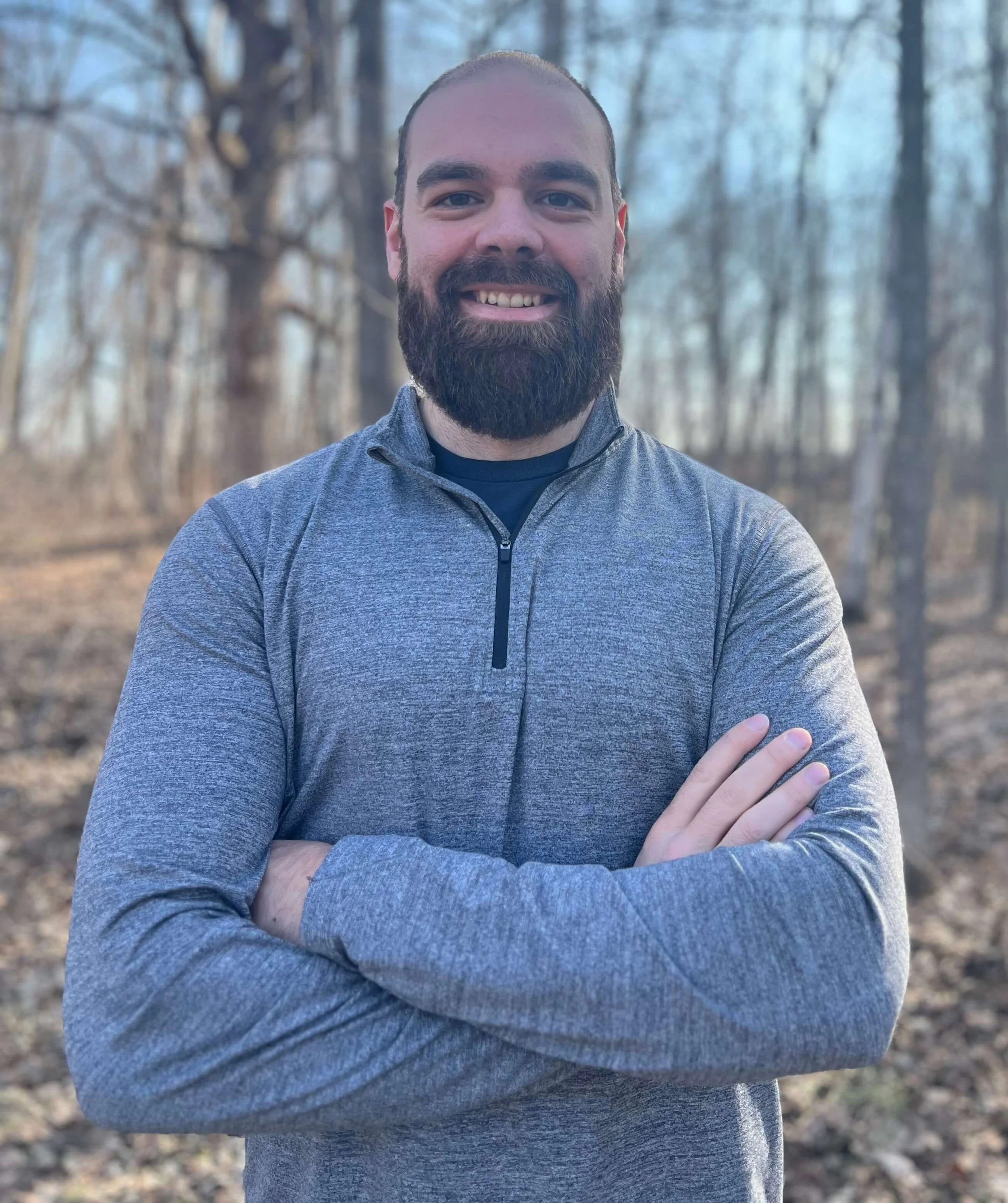 Portrait headshot of Dr. Jordon, a sports chiropractor and movement mechanics specialist at AxiomMvmt & Chiropractic clinic in Hopkins, MN.