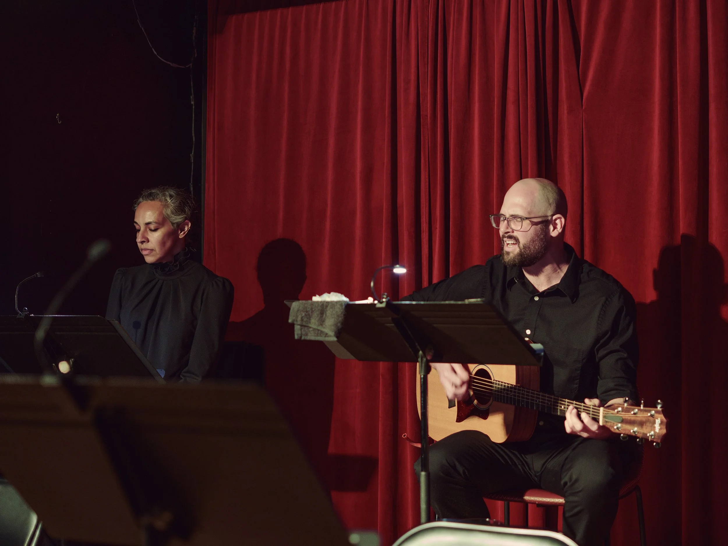 Desiree Lara (left) as Madame and Jeffrey Evans (right) as Musician