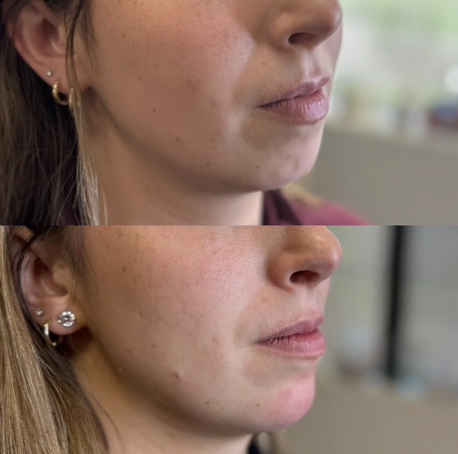 A beige speckled ceramic vase with a narrow neck holding dried branches with small seed pods, placed on a wooden surface with sunlight casting a shadow on a plain beige wall.