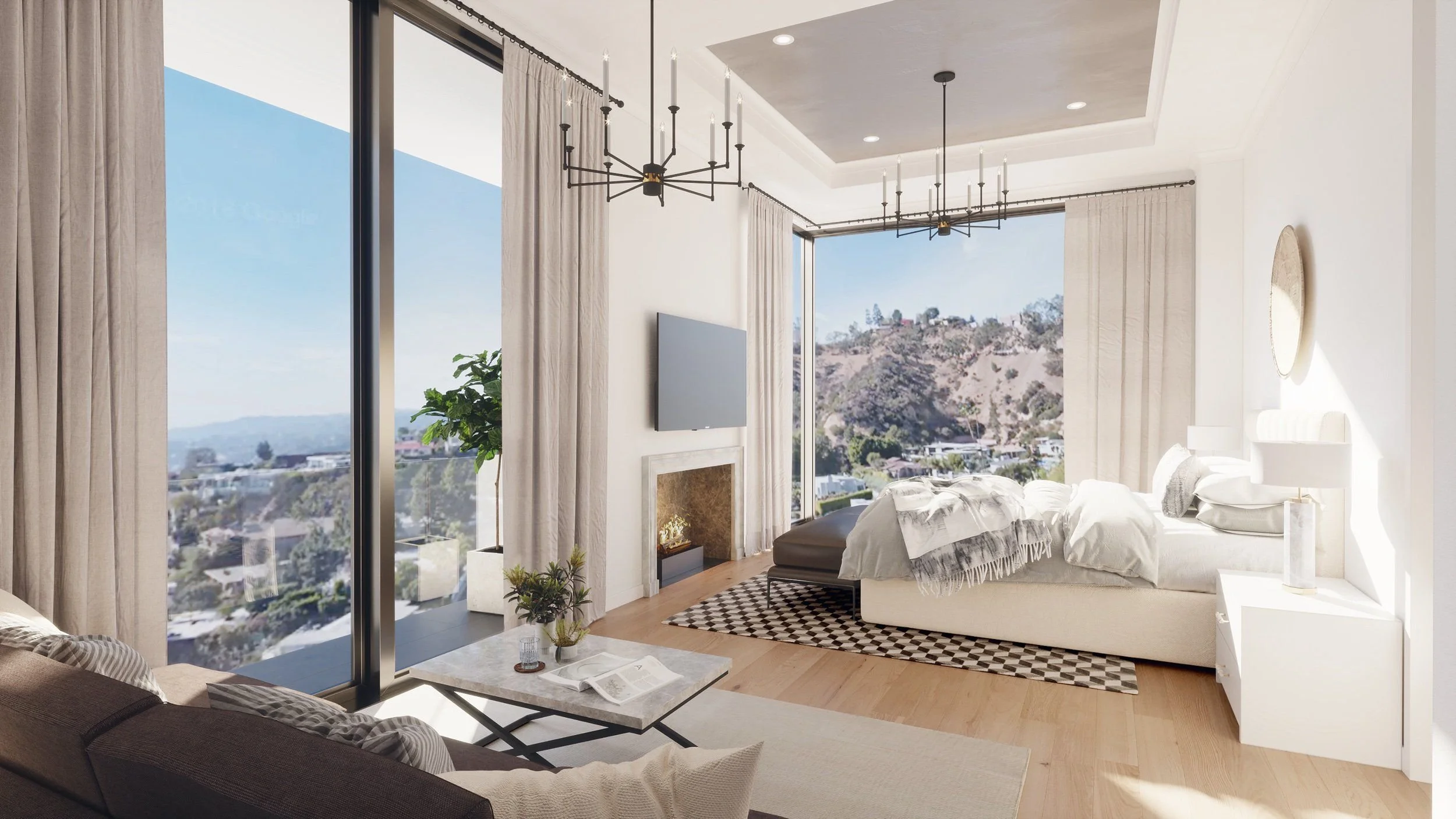 A modern living room with large windows showing a hillside view, a white bed with pillows, chandeliers, curtains, and a fireplace.