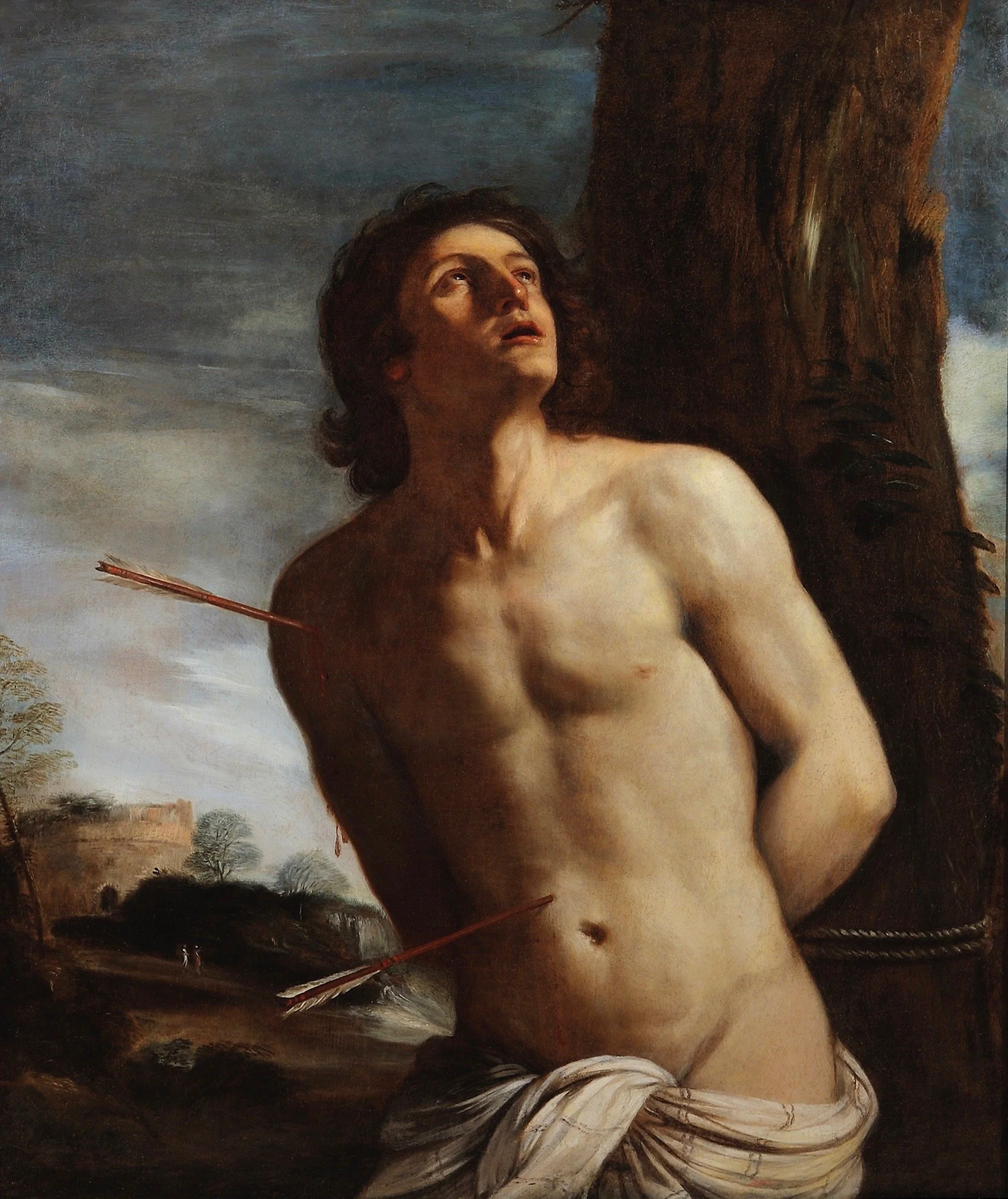 Baroque-style painting of Saint Sebastian bound to a tree with arrows in his body, gazing upward in suffering