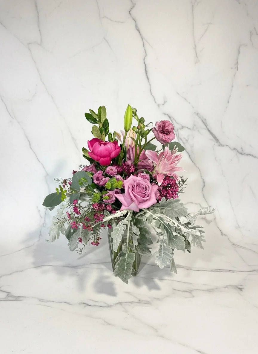 Garden-Inspired bouquet with pink blooms and organic greenery by Dallas wedding florist Izalena Floral House.