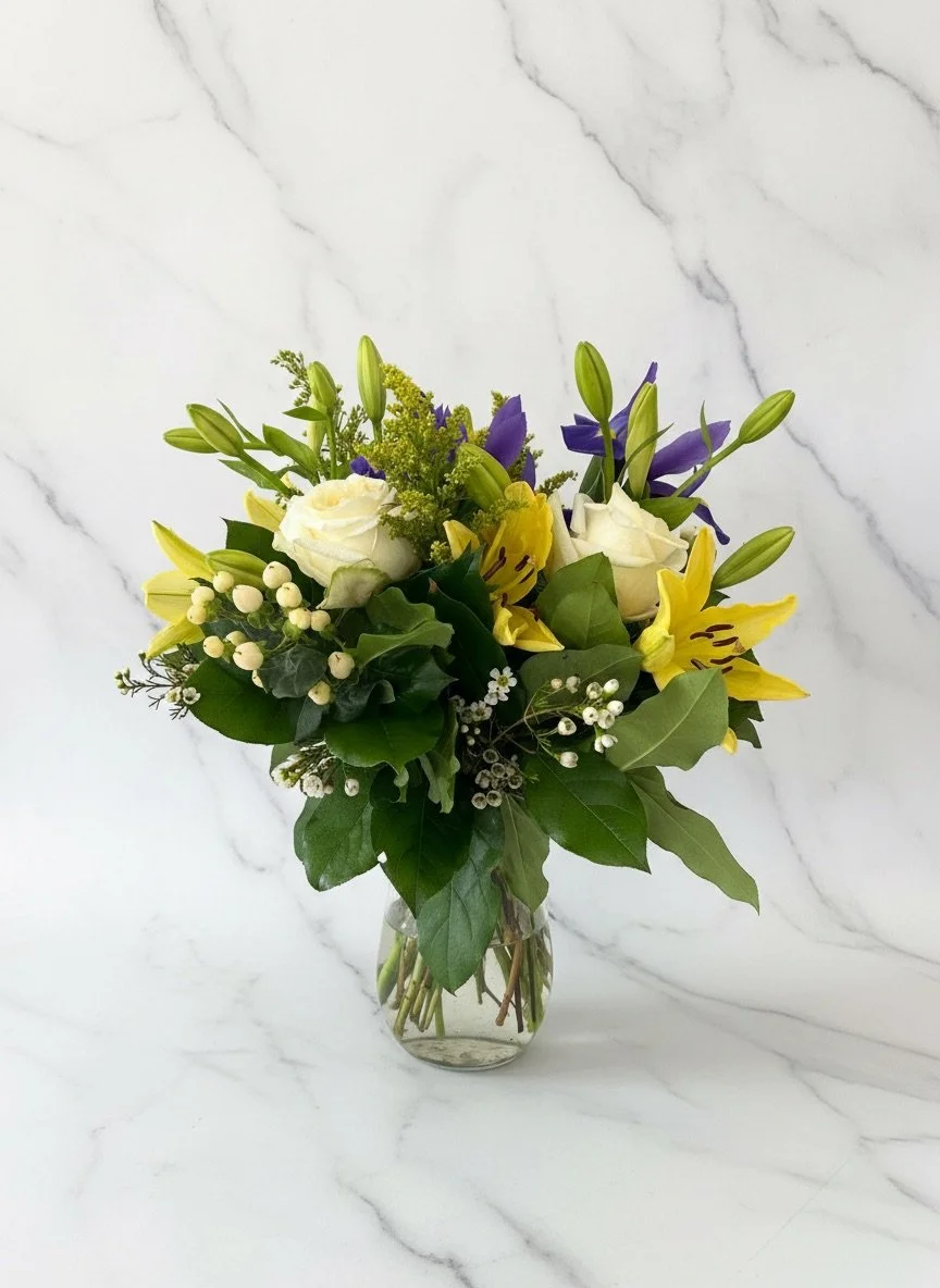 Garden-Inspired wedding bouquet with soft neutral blooms and organic greenery by Dallas wedding florist Izalena Floral House.