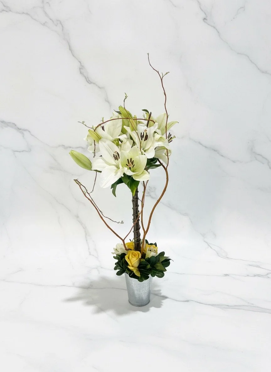 Unique Custom Floral Arrangement with soft neutral blooms and organic greenery by Dallas wedding florist Izalena Floral House.