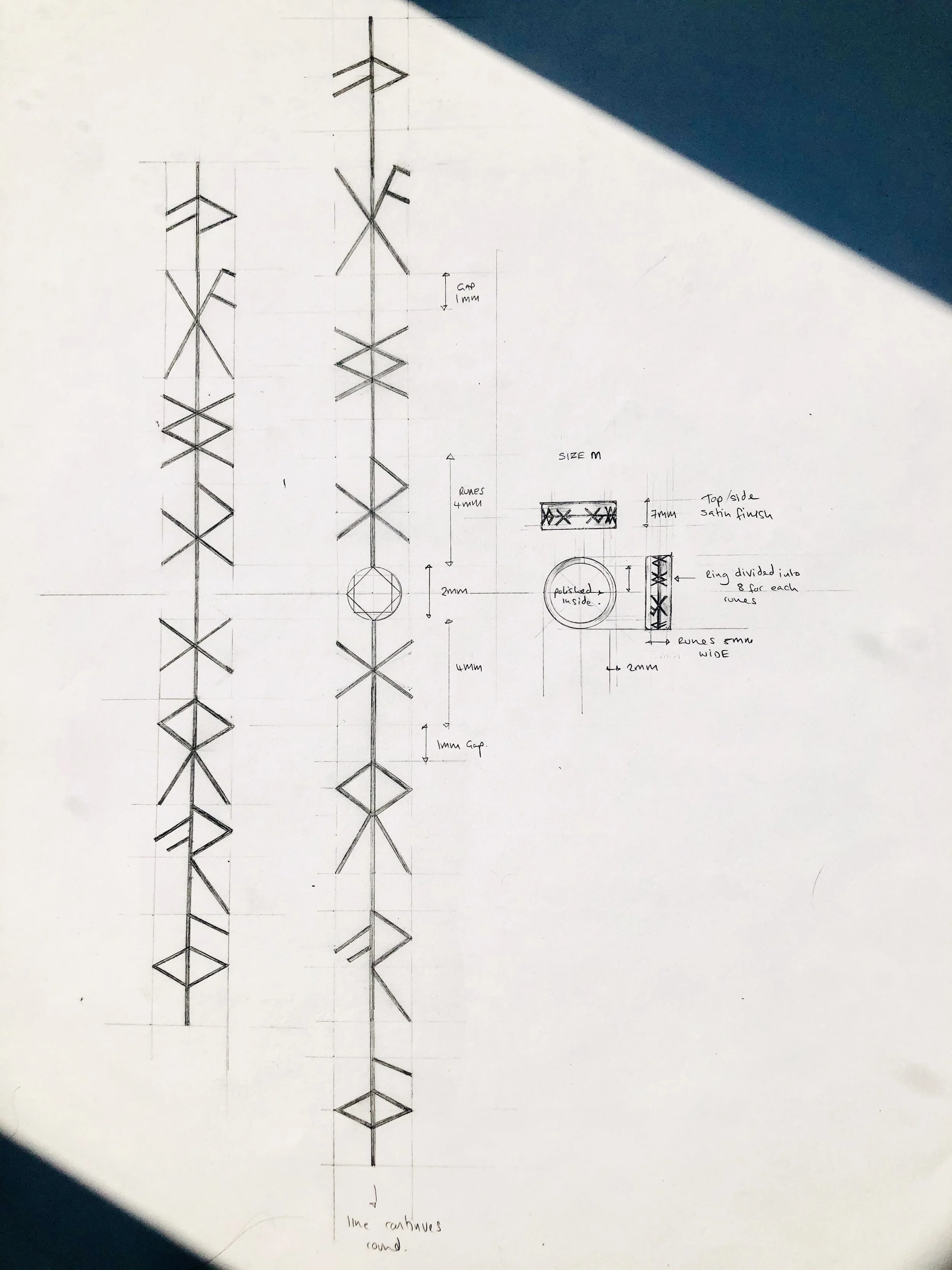 Bespoke design wedding ring runes.jpg