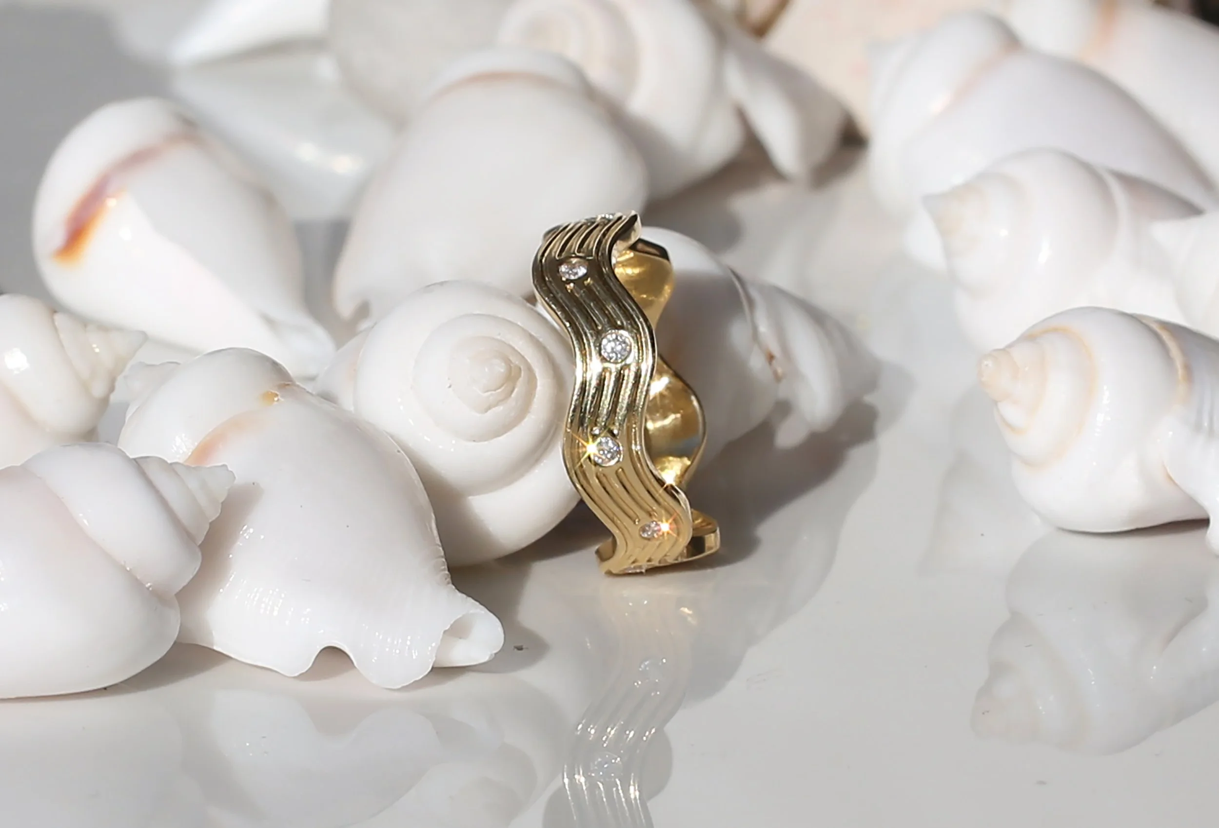 ric rac 18ct gold ring with diamonds.jpg