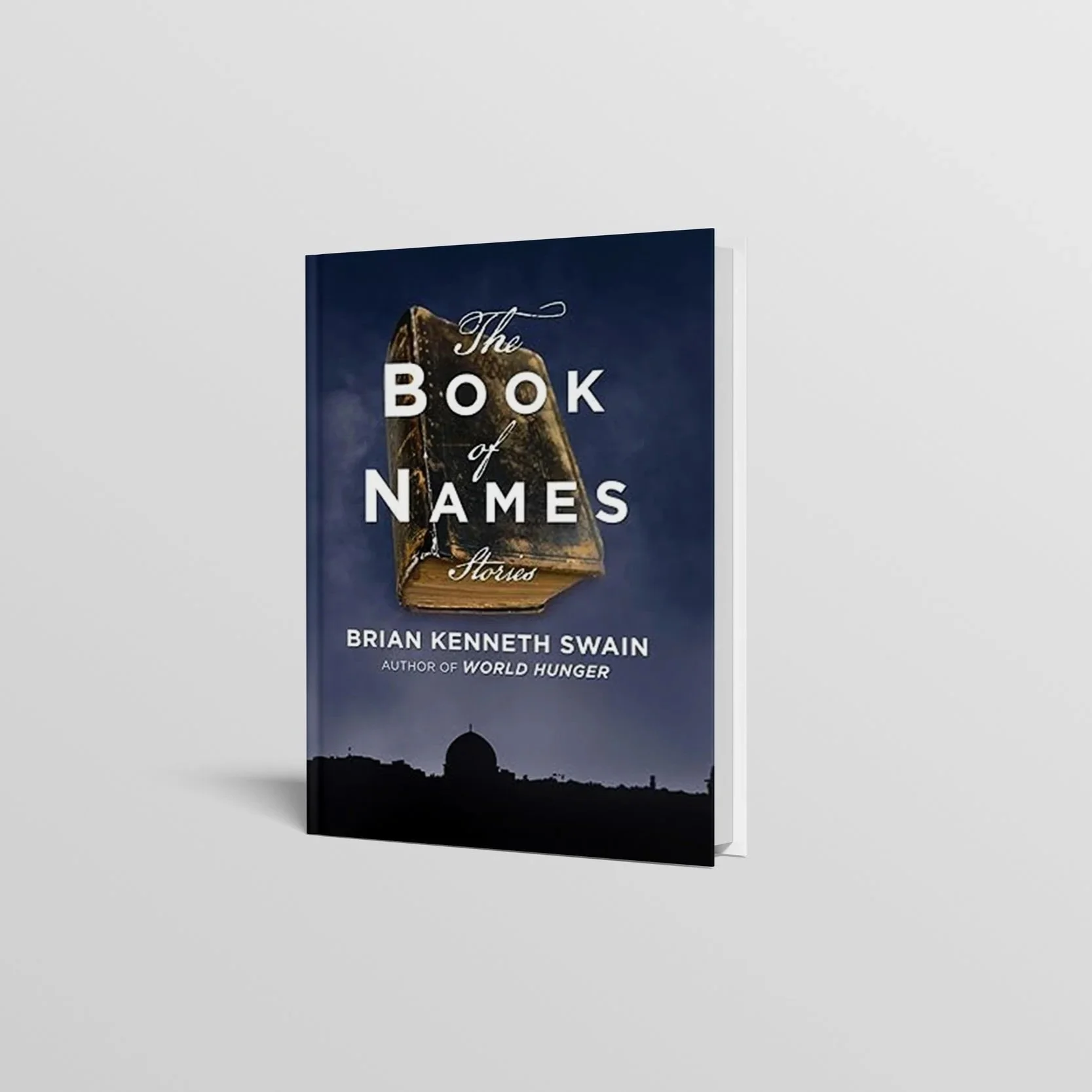Cover of the book 'The Book of Names' by Brian Kenneth Swain, featuring a large, old, leather-bound book with a dark blue sky backdrop and a silhouette of a building at the bottom.
