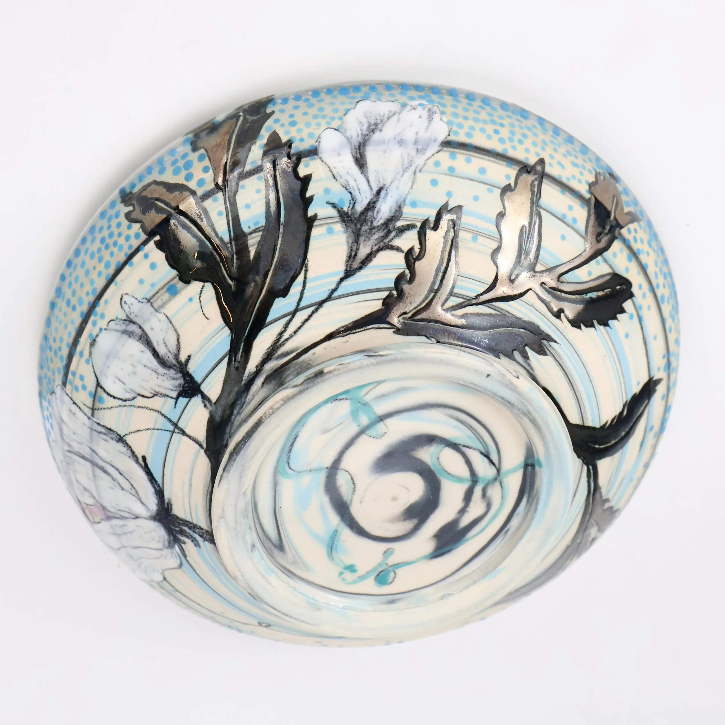 Porcelain marbled Blate with floral design, black and white underglaze pencil drawings of flowers, with palladium glaze.