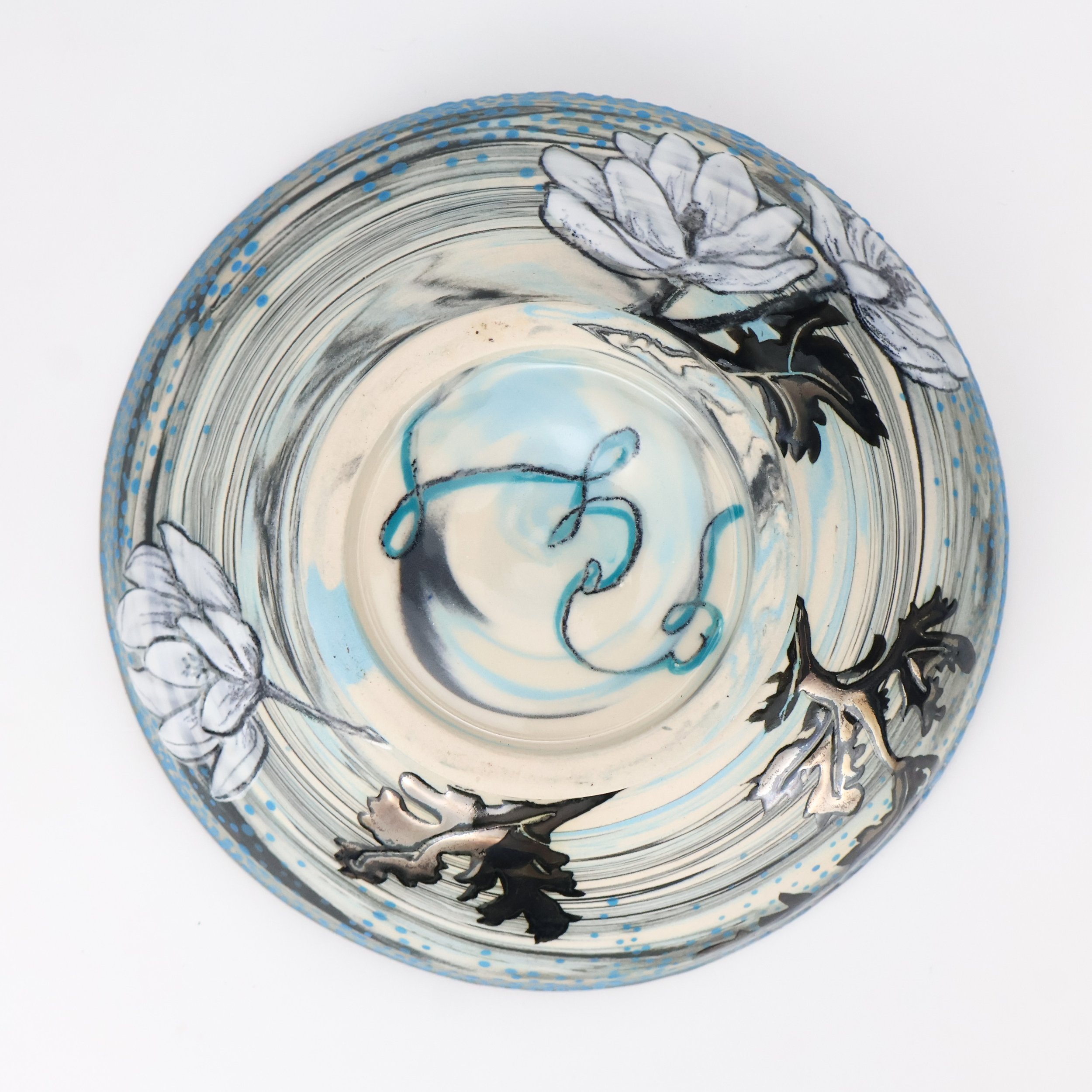 Porcelain marbled Blate with floral design, black and white underglaze pencil drawings of flowers, with palladium glaze.