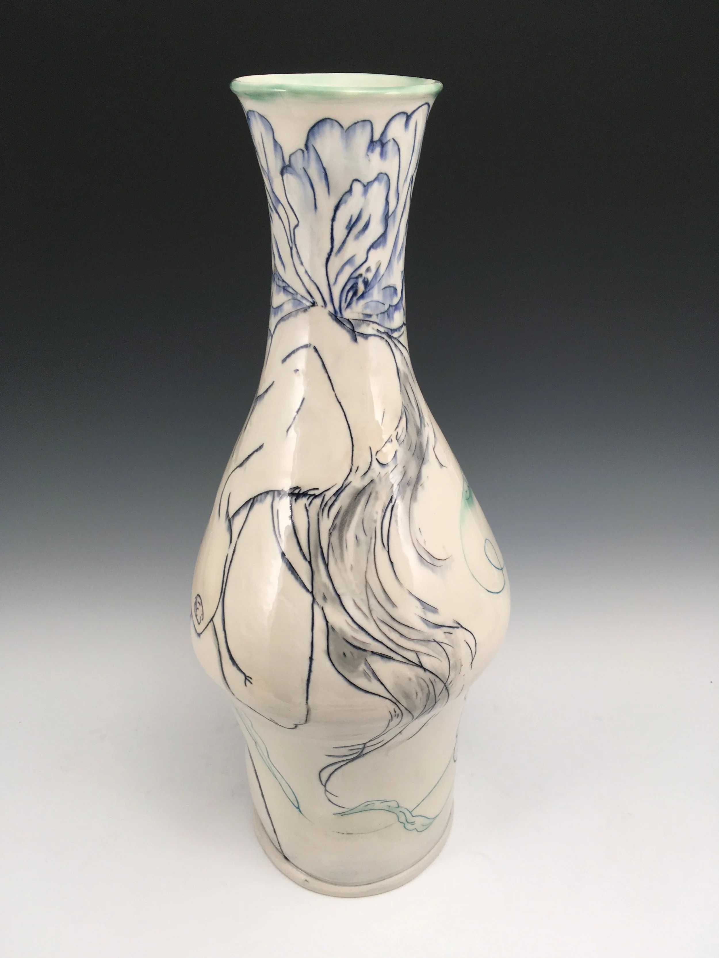 Ceramic porcelain figurative vessel, with inlayed cobalt Mishima, layered glazes, and underglaze.