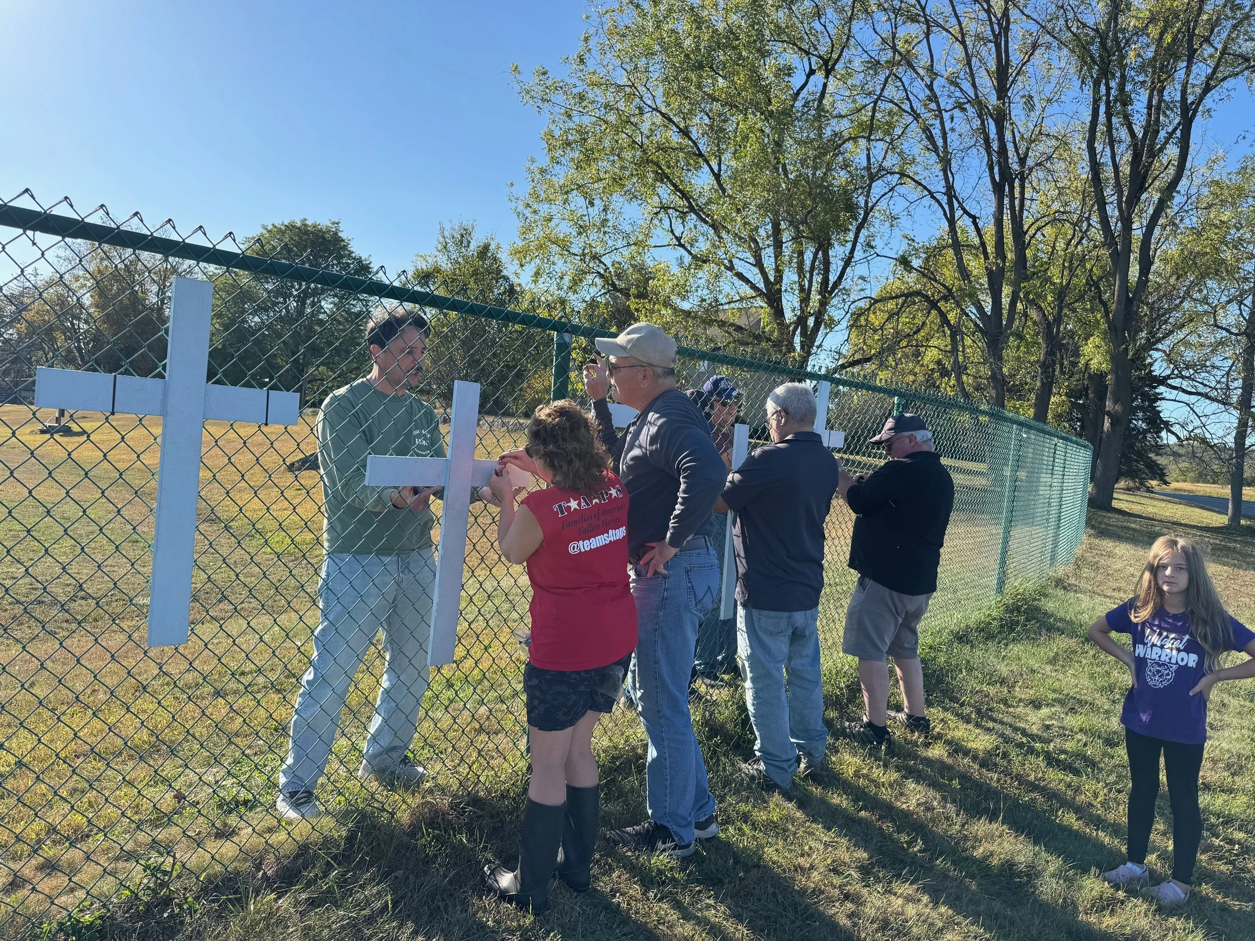 Helping Right to Life Ministry Hang Crosses on Penning's Fence Oct. 2025