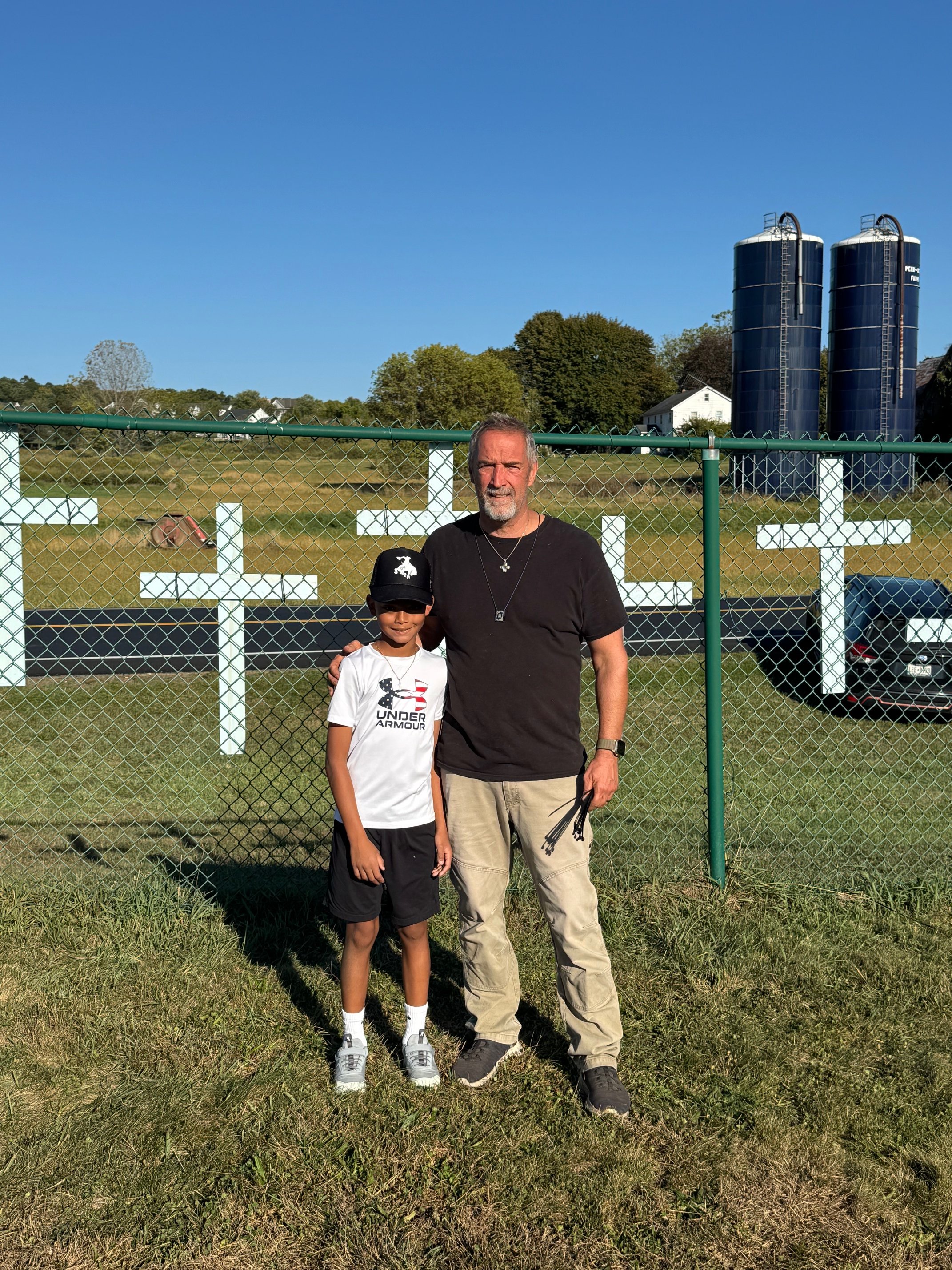 Helping Right to Life Ministry Hang Crosses on Penning's Fence Oct. 2025