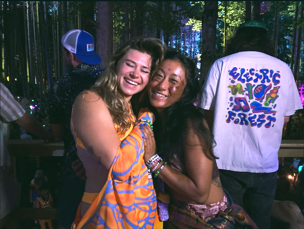 Monica and a friend at The Honeycomb at Electric Forest