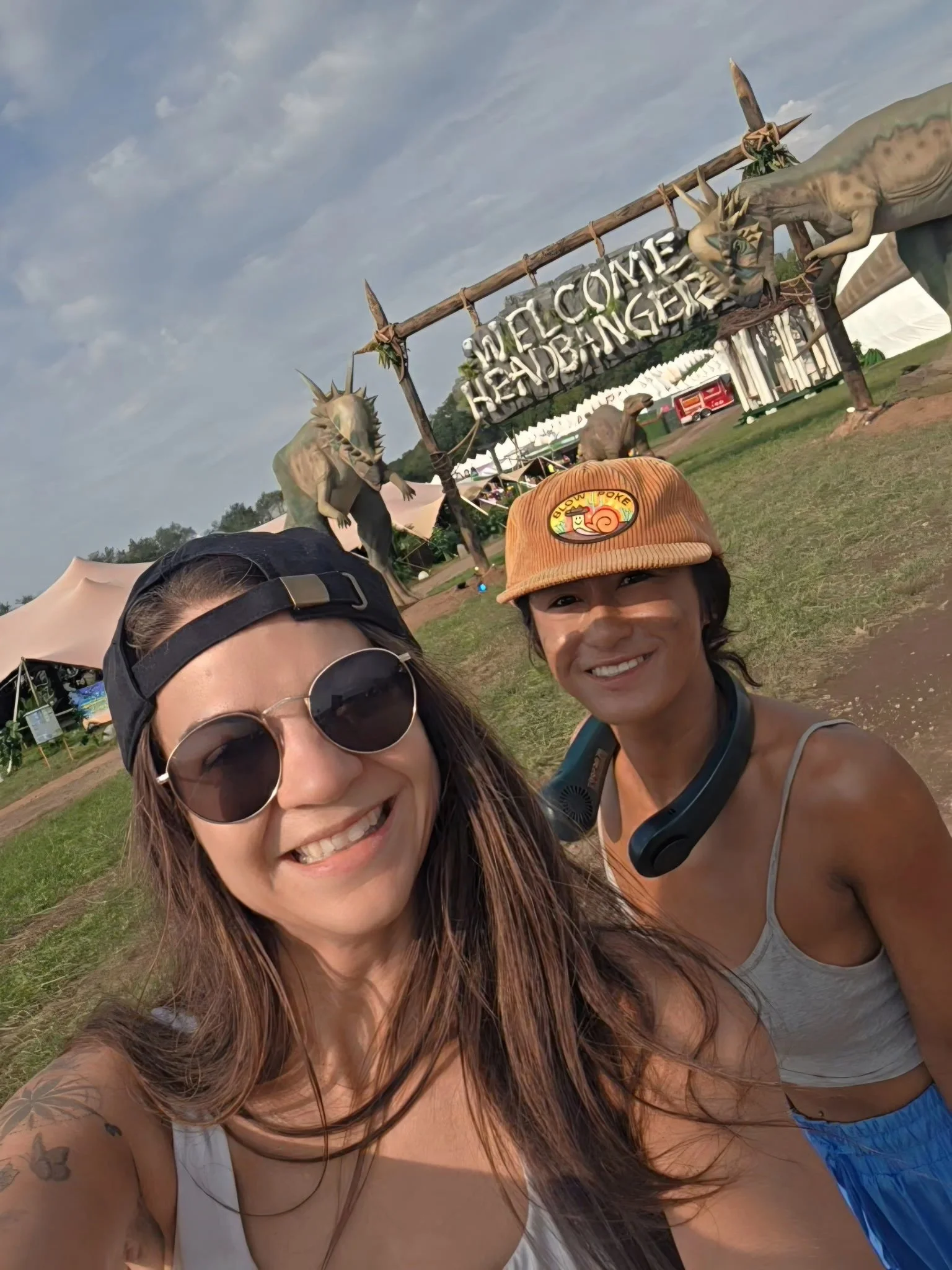 Monica and Amanda at the Welcome Headbangers entrance at Lost Lands
