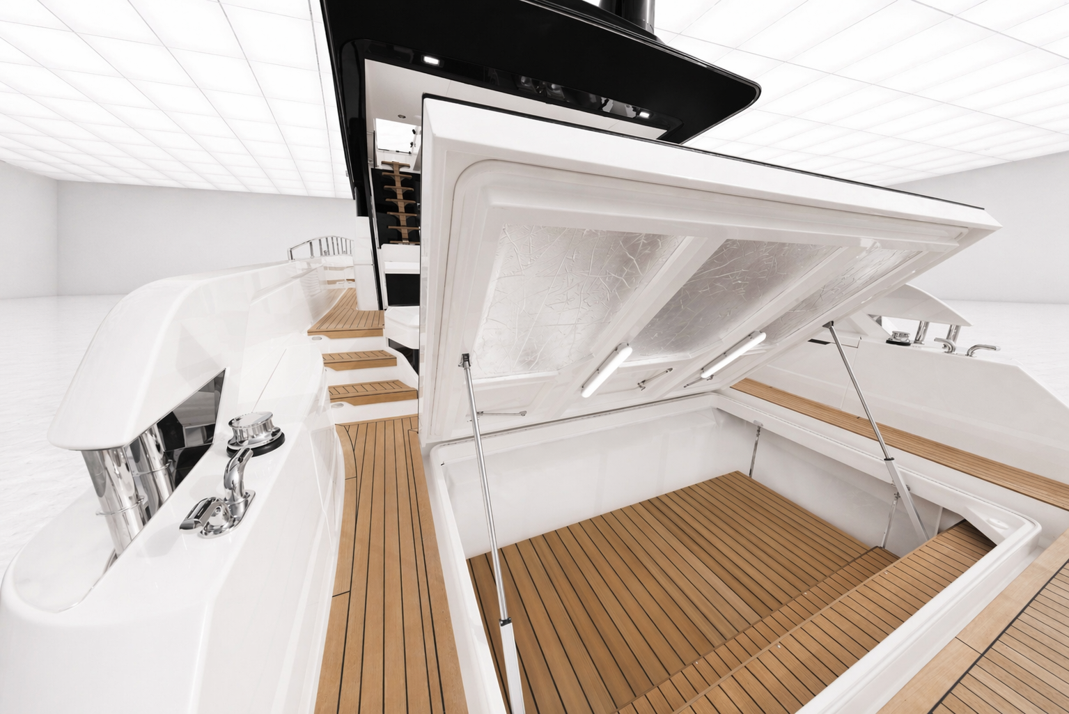 A modern yacht with an open hatch revealing a deck with wooden flooring, built-in seating, and a storage area.