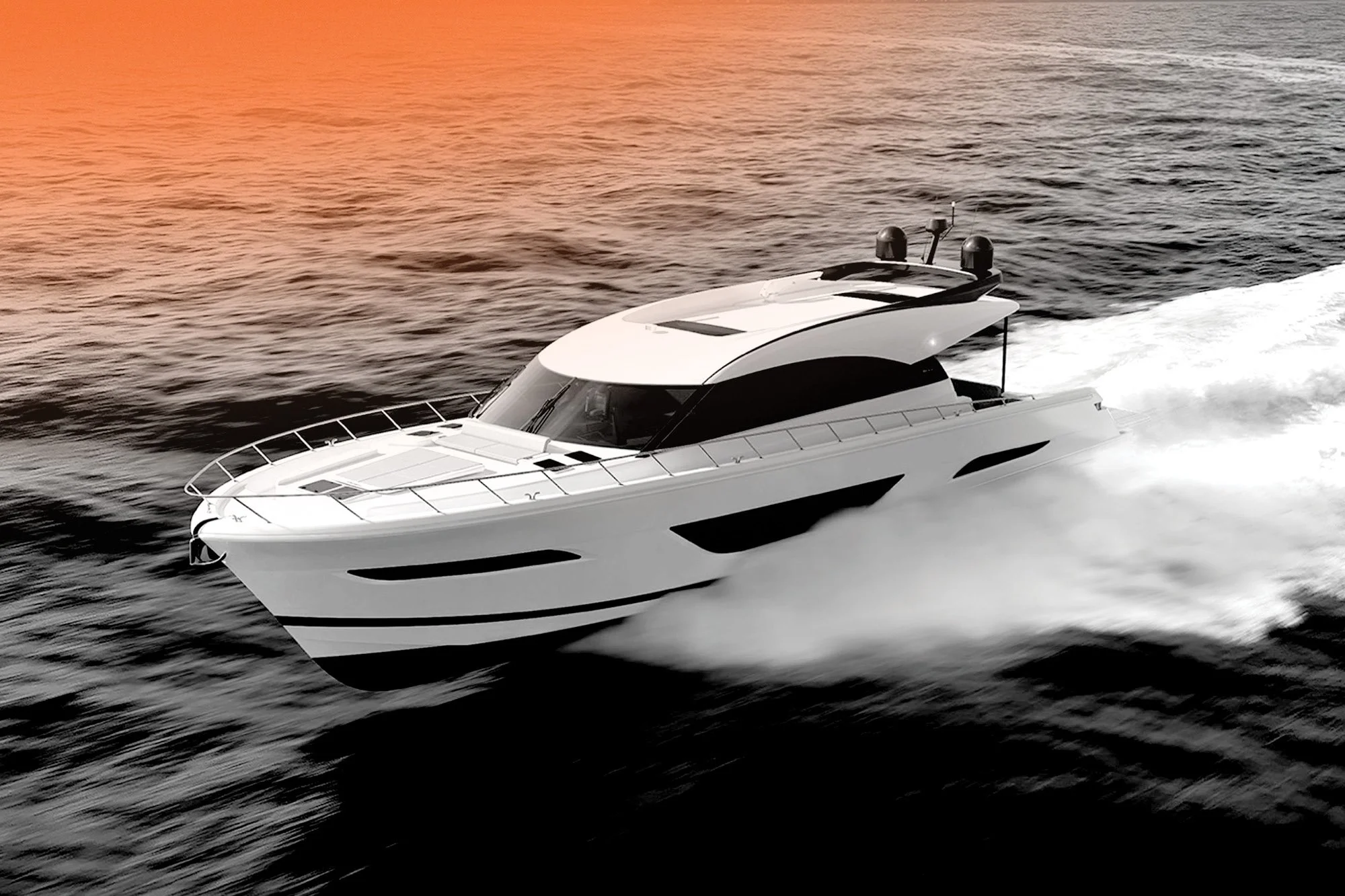 A white luxury yacht with black accents speeds across the ocean during sunset, creating waves in its wake.