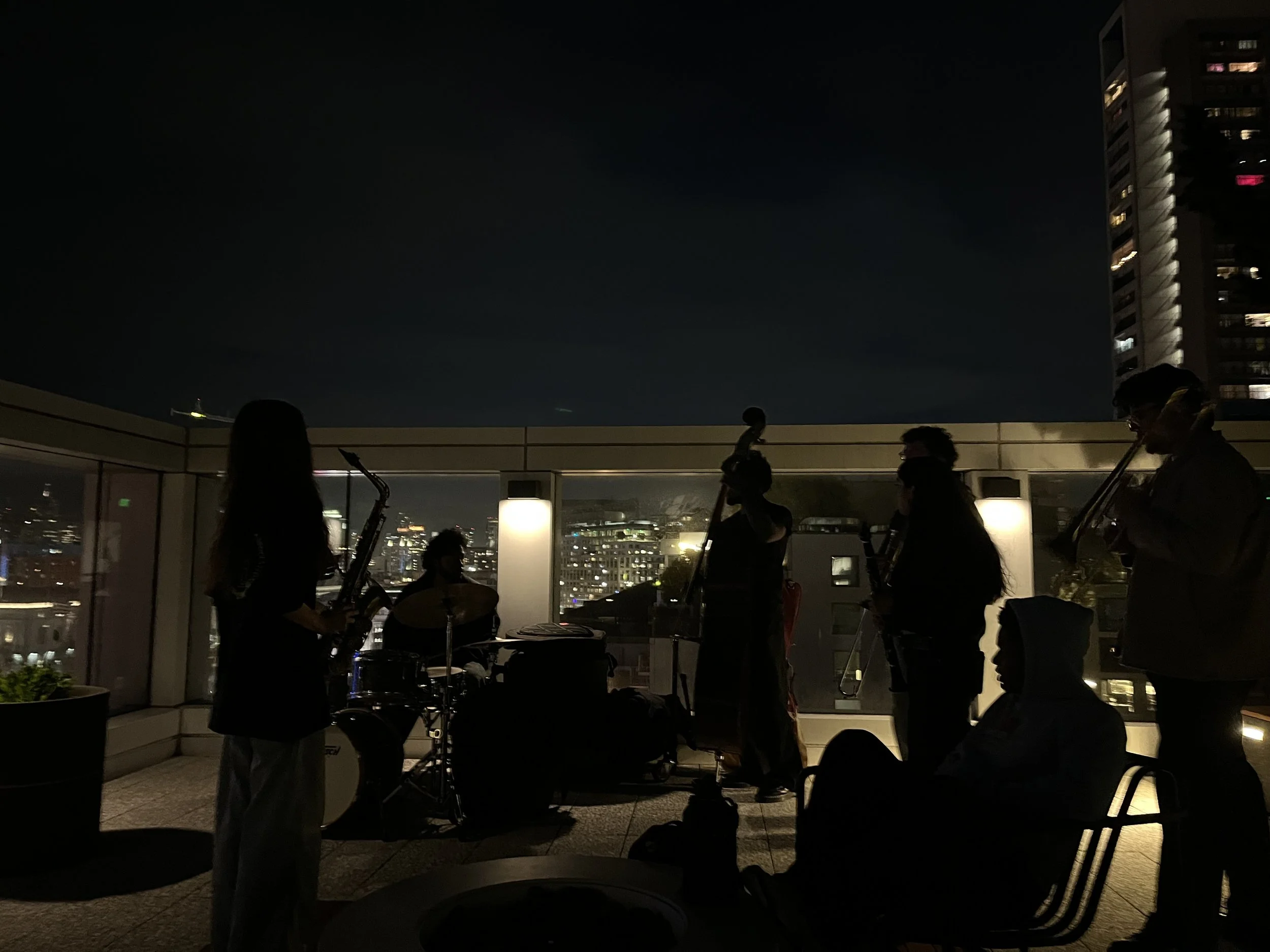 RJAM students at SFCM jamming on the rooftop at night.