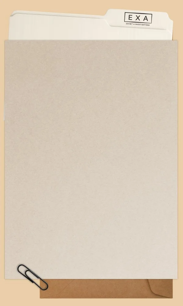 A manila folder labeled "EXA EXAMINATIONS" partially visible at the top, with a blank sheet of paper secured with a paper clip at the bottom, resting on a brown surface.