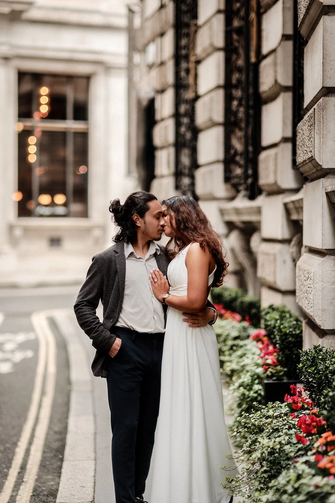 A bride and groom going in for a kiss taken by the wedding photographer Darius N Fernandes in the netherlands 