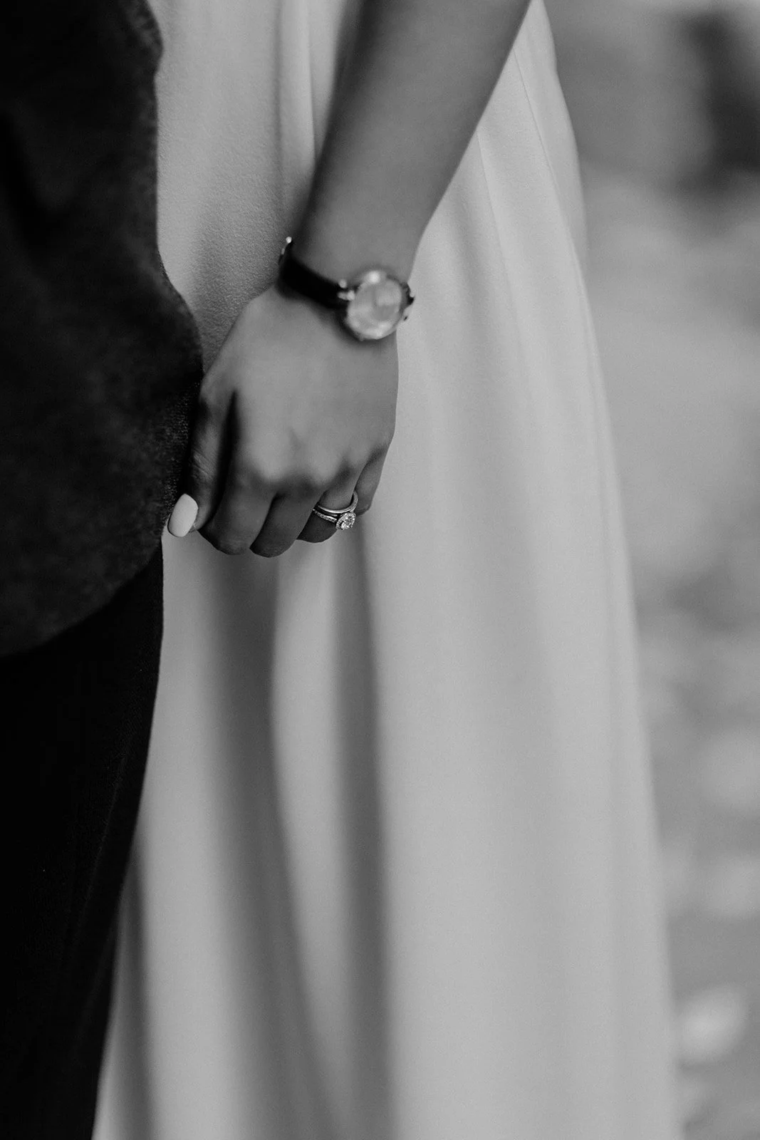 A closeup of the brides hands as they are standing close to each other taken by wedding photographer Darius N Fernandes