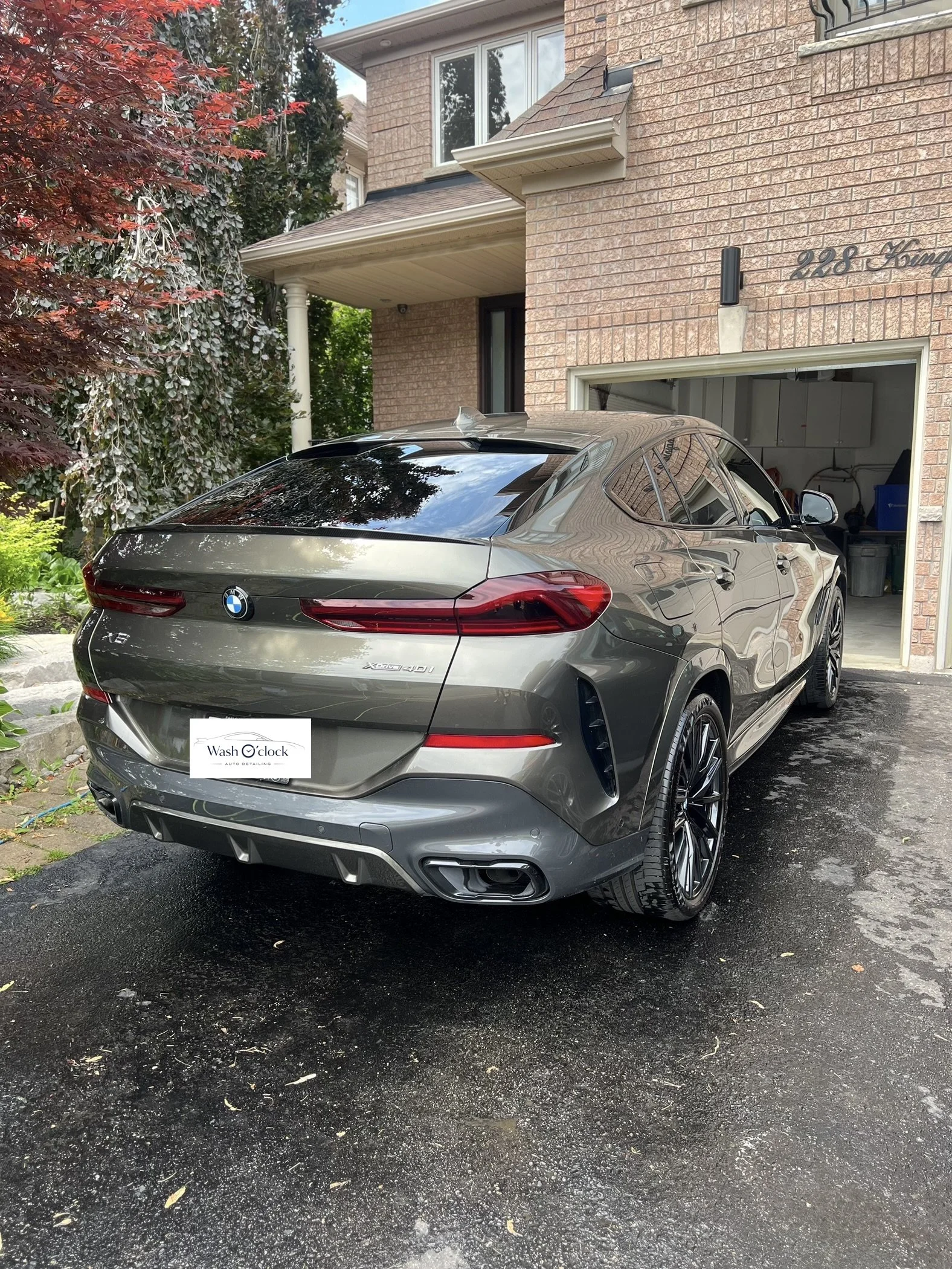 A gray BMW SUV mobile car detailing exterior results driveway Toronto