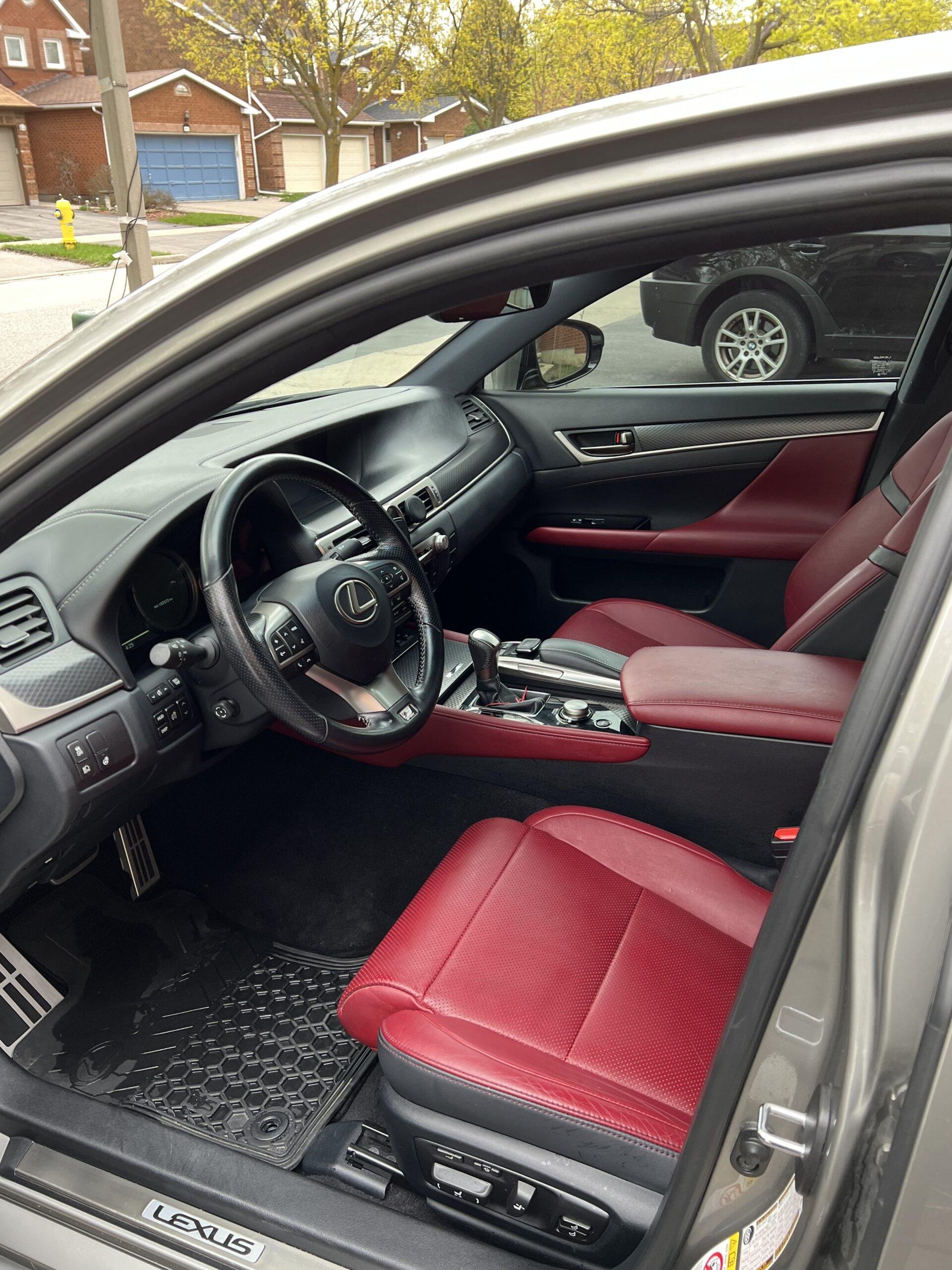 Inside of a Lexus car showing red leather seats. car interior detailing red leather seats deep clean Toronto