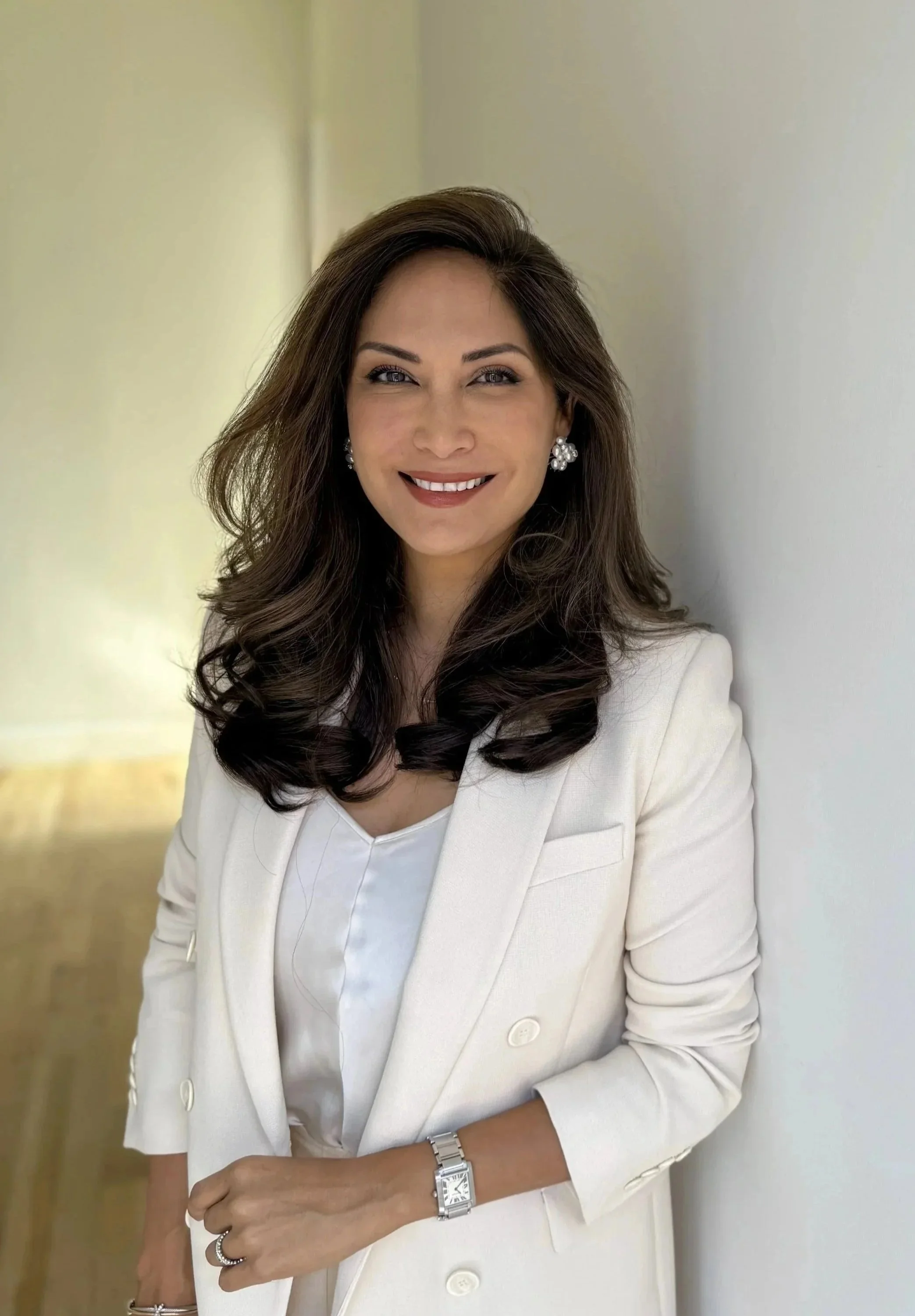 Professional portrait of Melissa Miranda executive coach smiling confidently, representing experienced leadership, grounded guidance, and strategic clarity.